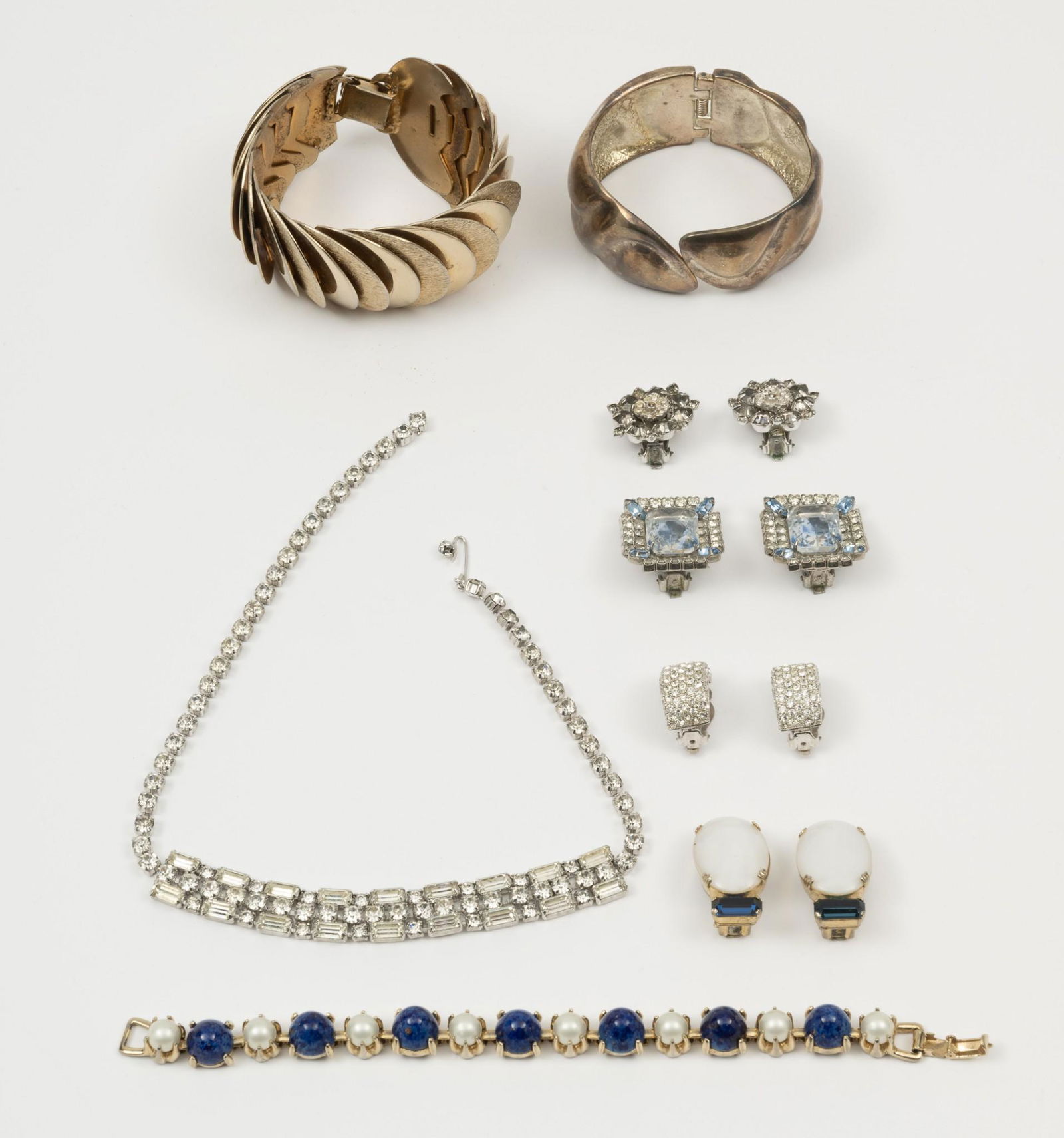 8 Pcs Vintage Costume Jewelry: Bangles 2-1/4" to 2-1/2" interior diameter; 1-1/4" to 2" wide. Bracelets 7" long. Clip on earrings 1" to 1-1/4" long. IMPORTANT: Before bidding, please read the terms and conditions. When you register