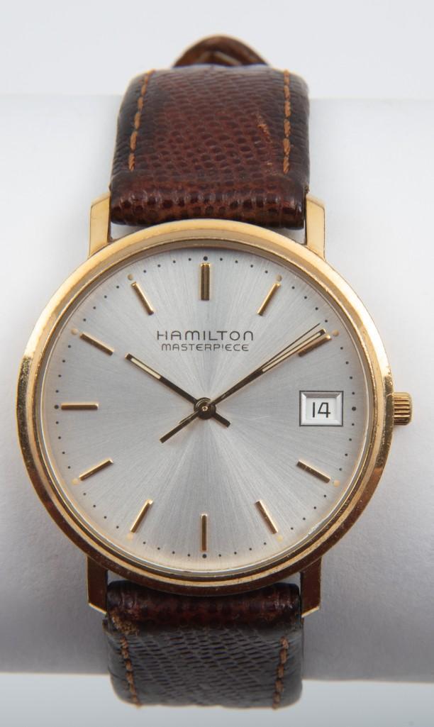 Hamilton Masterpiece Wristwatch: Gold filled case with stainless back. 1-1/2" lug to lug. Runs. IMPORTANT: Before bidding, please read the terms and conditions. When you registered for the auction you agreed to these terms and will b