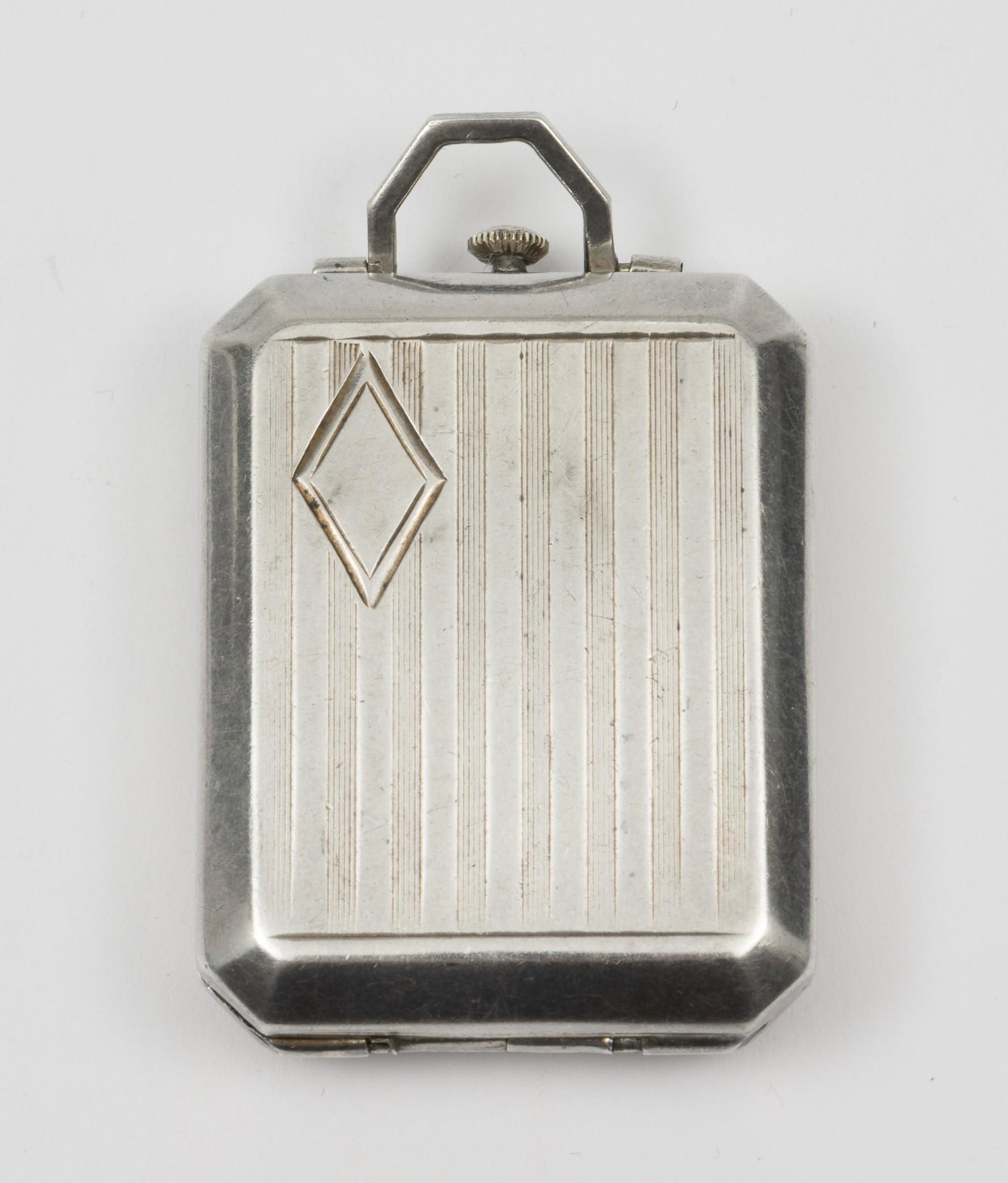 Antique Sterling Locket: 2" high x 1-1/4" wide. KE. IMPORTANT: Before bidding, please read the terms and conditions. When you registered for the auction you agreed to these terms and will be required to comply with them.