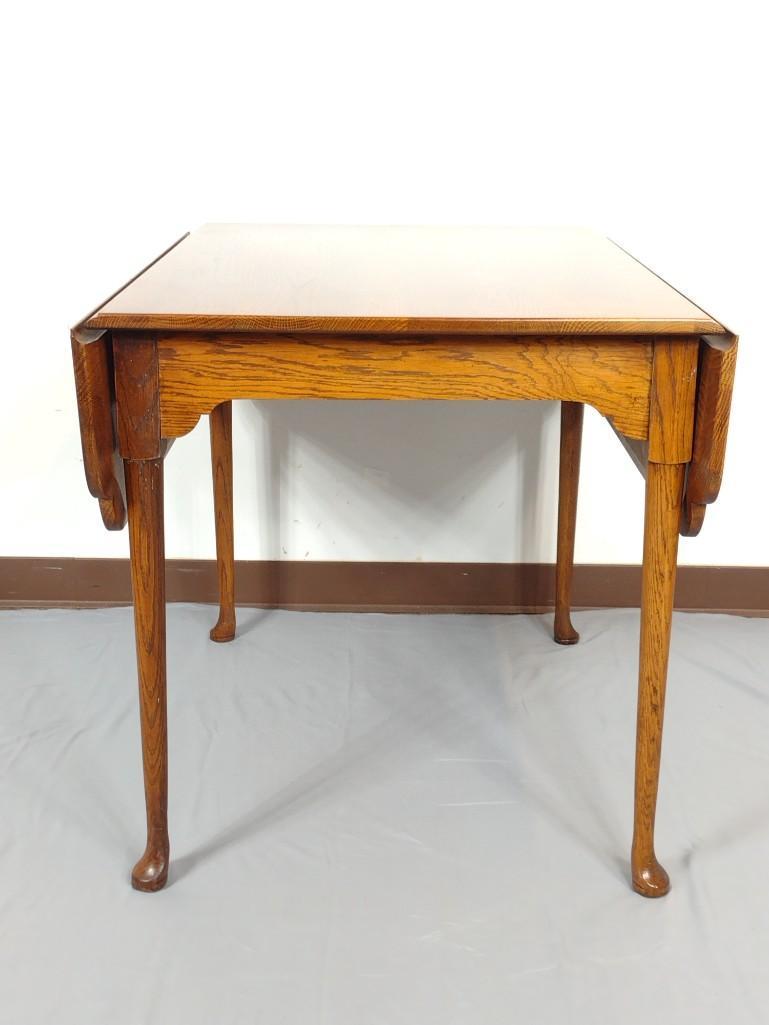 Drop Leaf Table: Open 48", closed 29" wide X 38" deep X 30" high. MG. IMPORTANT: Before bidding, please read the terms and conditions. When you registered for the auction you agreed to these terms and will be required