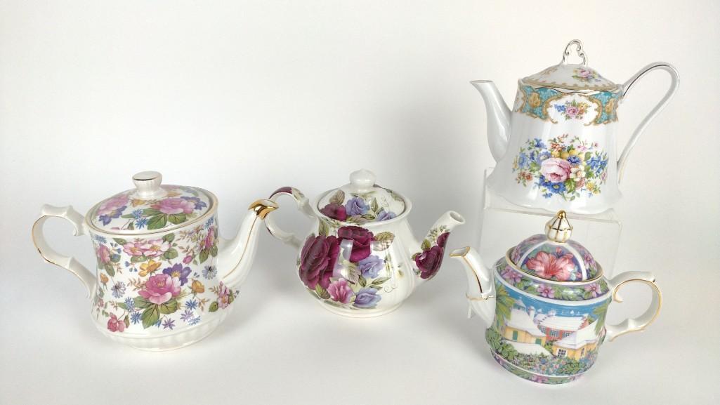 4 Porcelain Teapots incl Sadler: Also includes Windsor and Antique Reflections. 7" to 9" wide X 3-1/2" to 5-1/2" deep X 6" to 6-1/2" high. DM IMPORTANT: Before bidding, please read the terms and conditions. When you registered for th