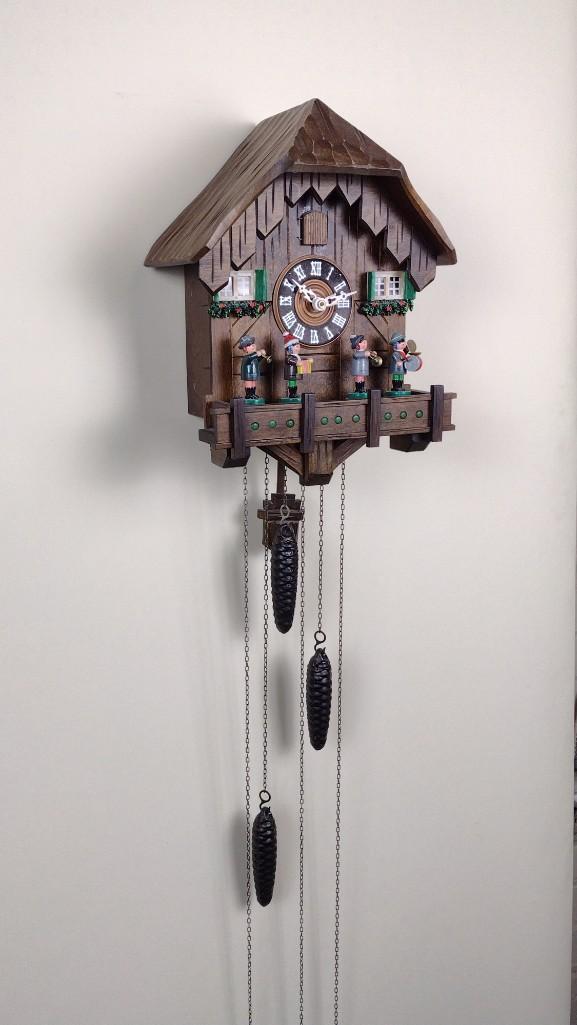 Cuckoo Clock: Starts and stops. 9-1/4" wide X 7" deep X 13" high . DM IMPORTANT: Before bidding, please read the terms and conditions. When you registered for the auction you agreed to these terms and will be requi