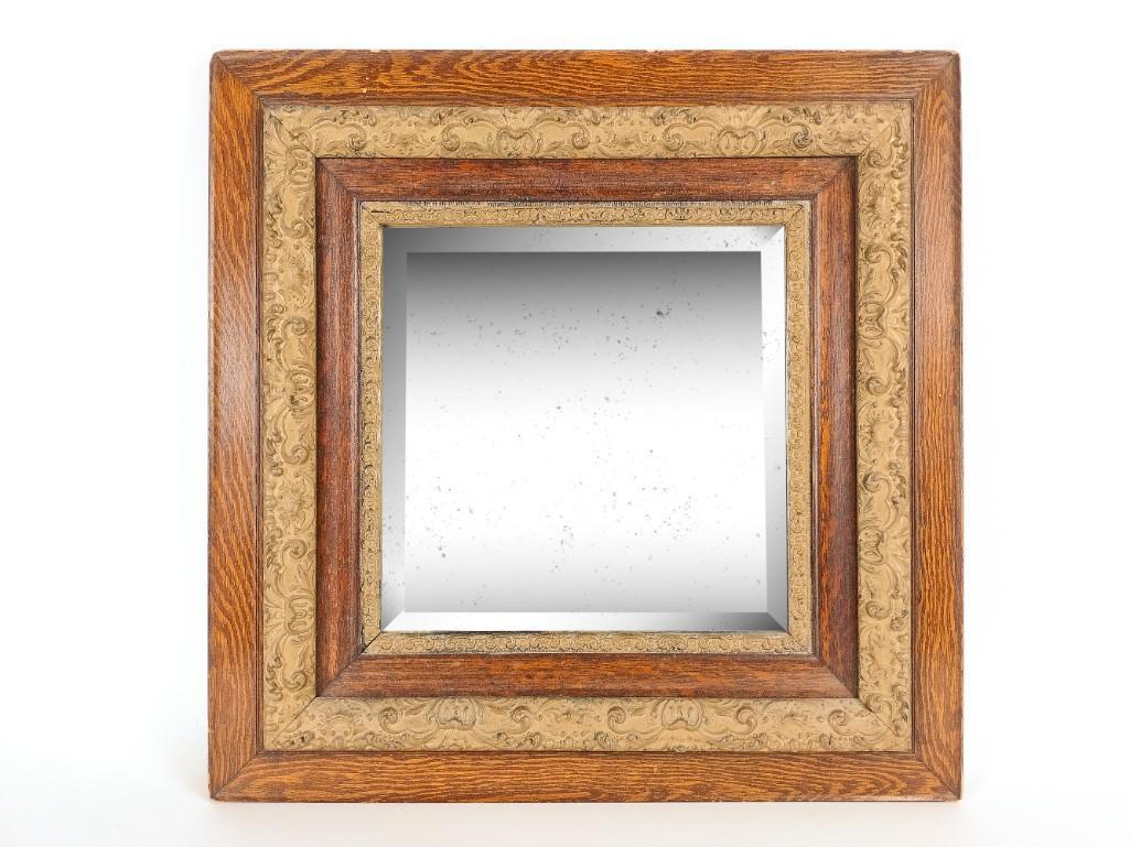 Antique Beveled Glass Mirror: Overall with frame 24-1/4" square. Some spotting and streaking to glass. Some wear to frame. DM IMPORTANT: Before bidding, please read the terms and conditions. When you registered for the auction you