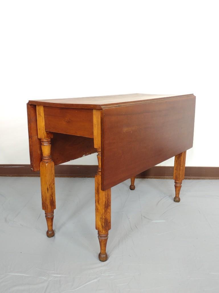 Drop Leaf Table: Open 44", 18 1/2" closed X 39" deep X 28 1/2" high. Some discoloring to table top. One leg has split at top. MG. IMPORTANT: Before bidding, please read the terms and conditions. When you registered fo