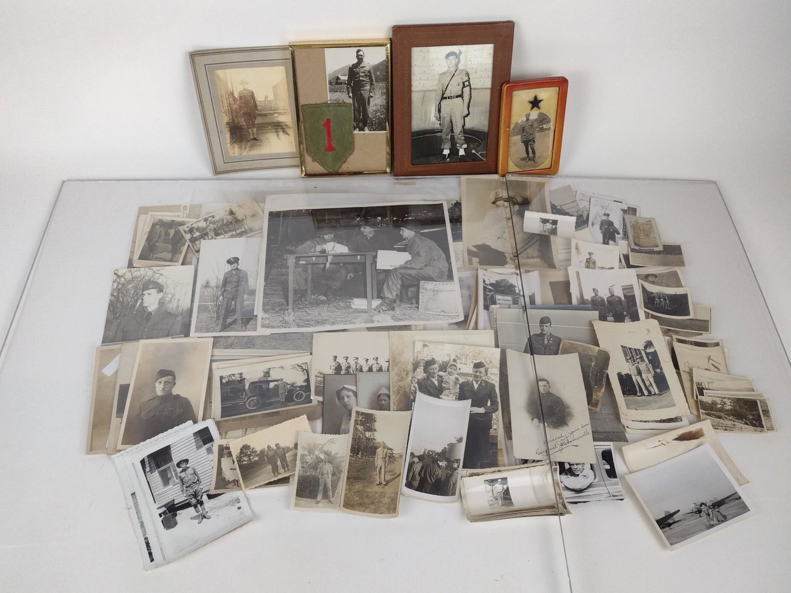 117 WWII Era Soldier Photographs incl Women: Includes women in uniform. Framed photographs 5-1/2" to 8-1/4" high x 3-1/2" to 6-1/4" wide. All other photographs 1-3/4" to 10" high x 2-3/4" to 8" wide. DP. IMPORTANT: Before bidding, please read th