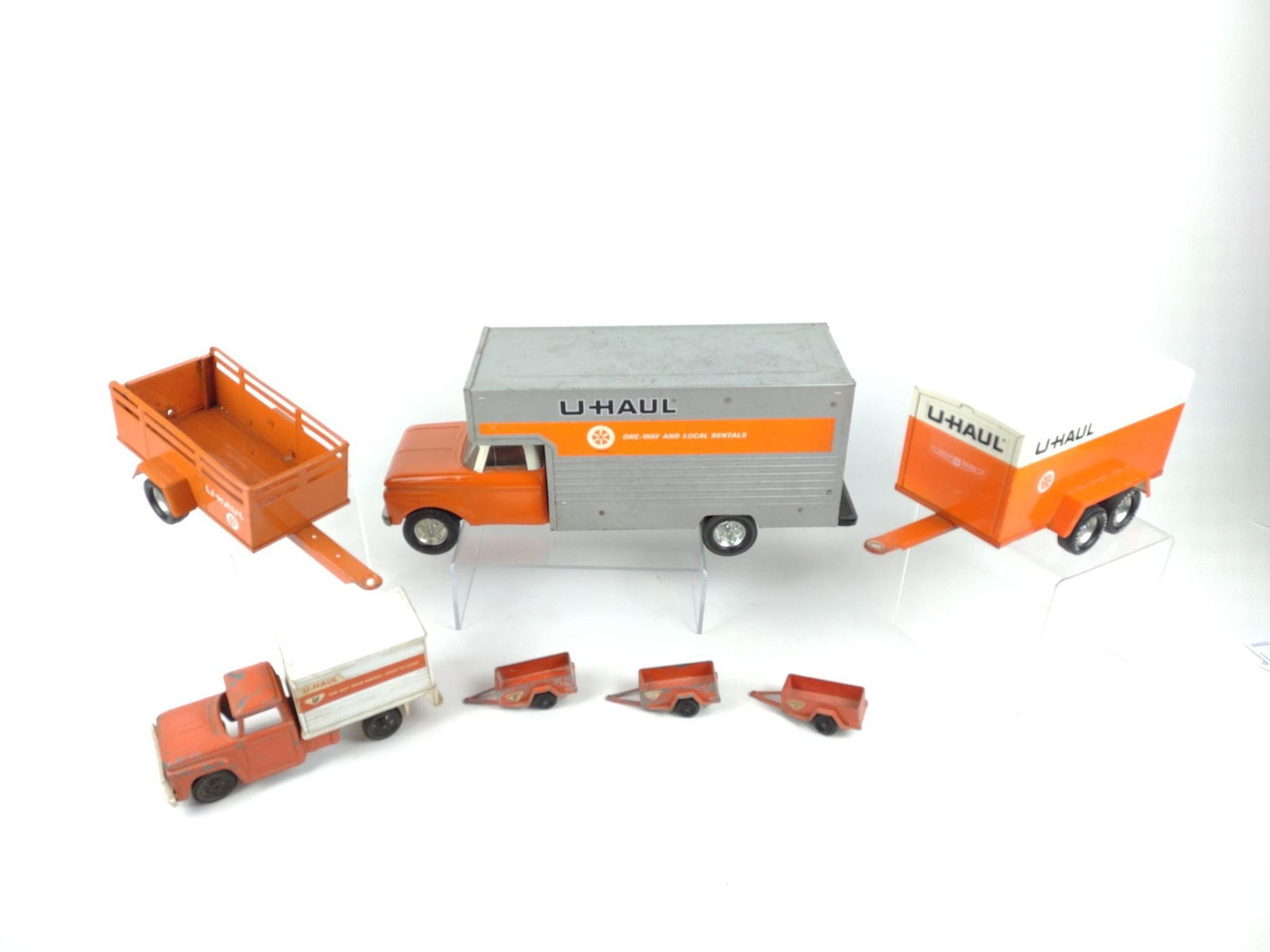 7 Pcs U Haul Trucks: 1 3/4" to 5 3/4" wide x 1 1/4" to 7 1/2" high x 18 3/4" long. JK IMPORTANT: Before bidding, please read the terms and conditions. When you registered for the auction you agreed to these terms and will