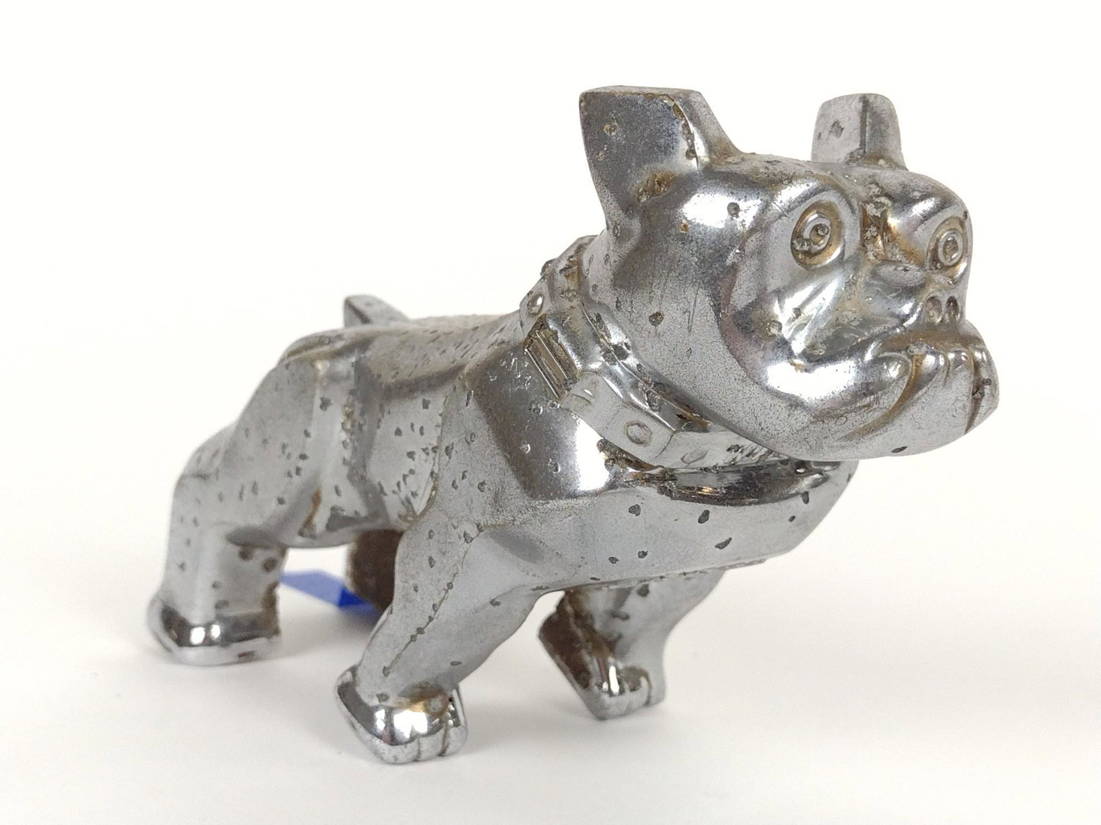 Mack Truck Hood Ornament: 3-1/4" high X 5" long. Pitting all over. DM IMPORTANT: Before bidding, please read the terms and conditions. When you registered for the auction you agreed to these terms and will be required to compl