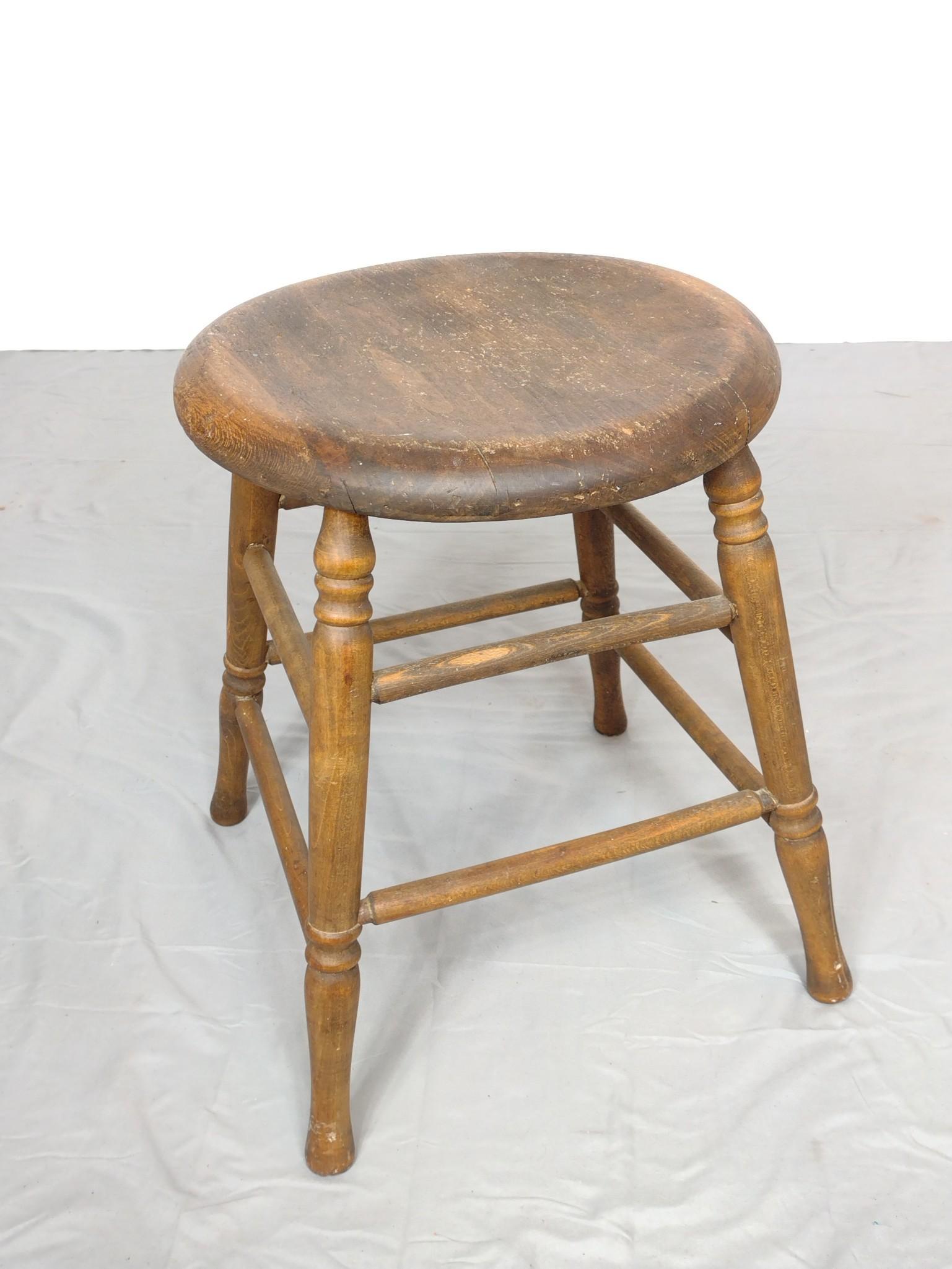 Milking Stool: 14" diameter X 18" high. Has some discoloring and finish loss. MG. IMPORTANT: Before bidding, please read the terms and conditions. When you registered for the auction you agreed to these terms and wi