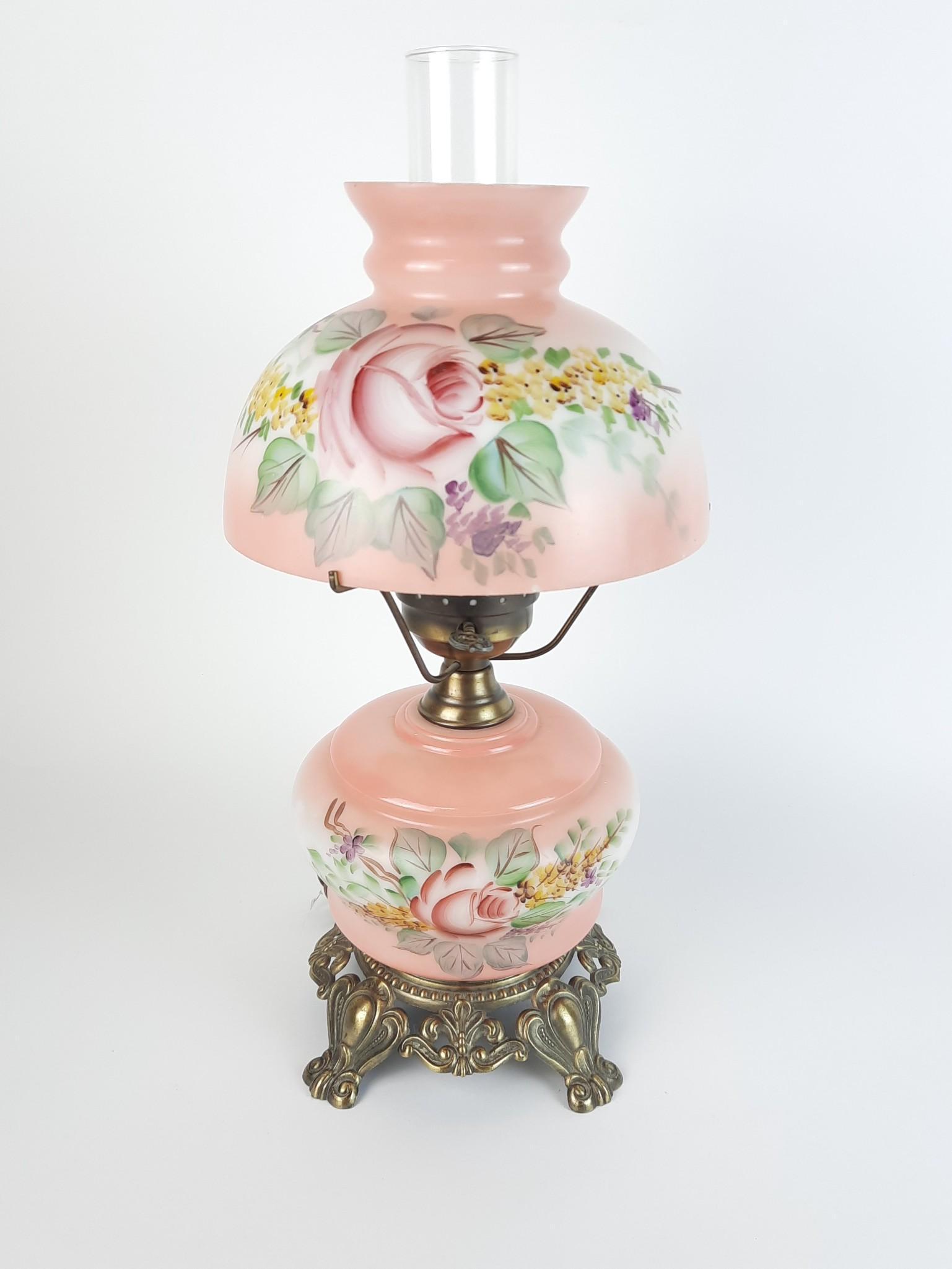 Floral Painted Gone with the Wind Lamp: Electrified. Working. Unsigned. 10" diameter x 21" high. Chips around shade top and bottom. LR IMPORTANT: Before bidding, please read the terms and conditions. When you registered for the auction you 
