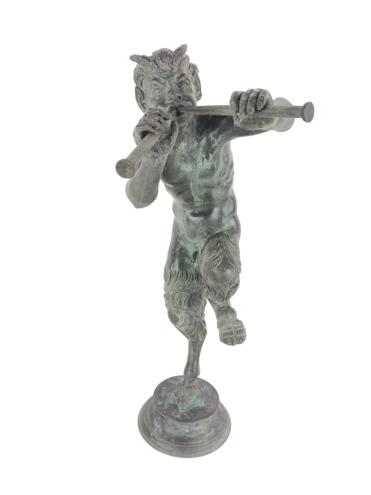 Bronze God of Pan Sculpture: Unsigned. 5" wide x 15 1/2" high x 9 1/2" deep. JK IMPORTANT: Before bidding, please read the terms and conditions. When you registered for the auction you agreed to these terms and will be required t