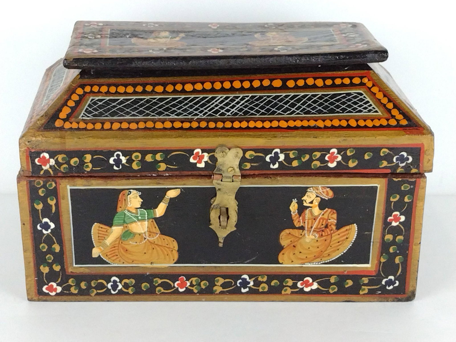 Indian Wedding Chest: Unsigned. 8" high x 7" deep x 13" wide. Some wear and crazing to paint. KE IMPORTANT: Before bidding, please read the terms and conditions. When you registered for the auction you agreed to these term