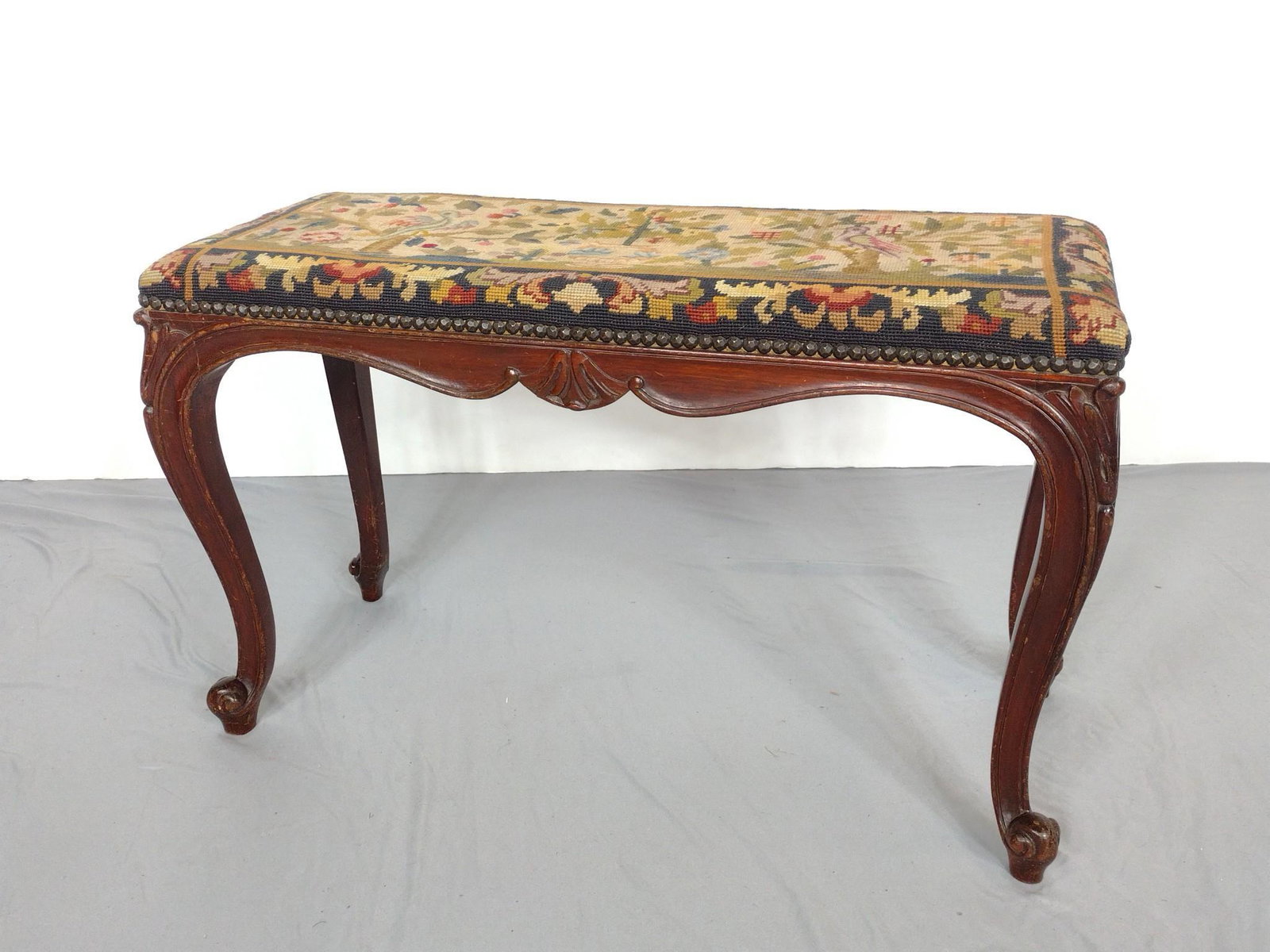 Needlepoint Bench: 31-1/2" wide X 13" deep X 19-1/2" high. Wood has some scratches. MG. IMPORTANT: Before bidding, please read the terms and conditions. When you registered for the auction you agreed to these terms and 