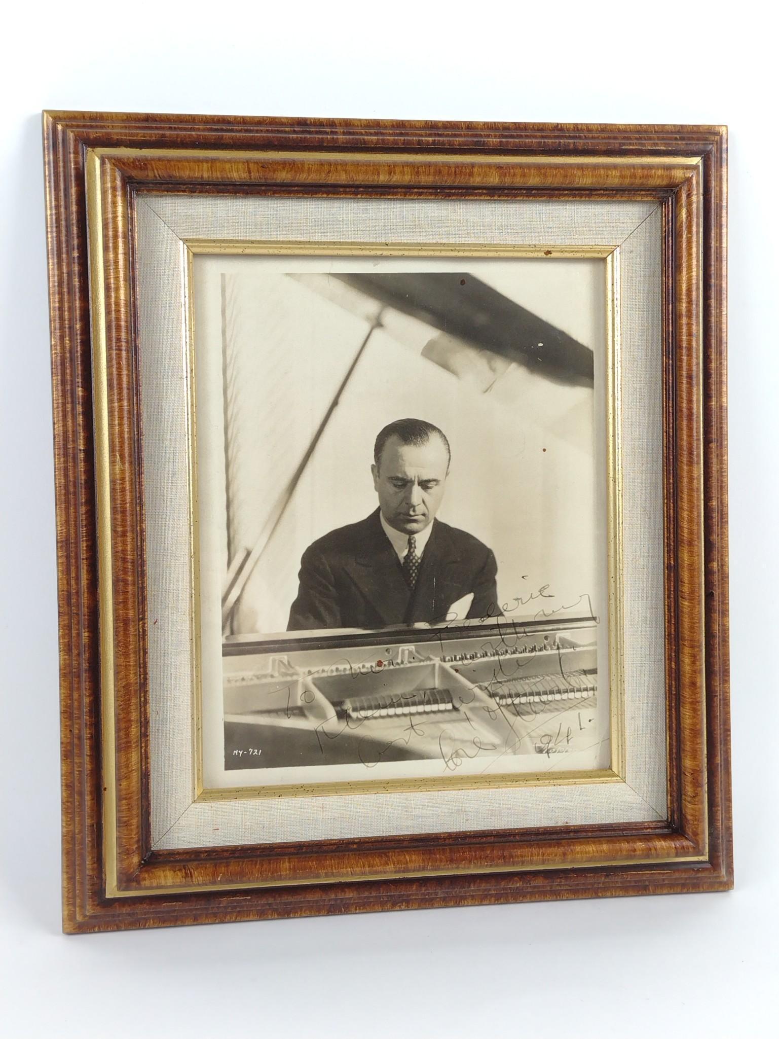 1941 Jose Iturbi Autographed Photo: Overall with frame 14-3/4" high X 12-3/4" wide. Photo only: 10" high X 8" wide. DM IMPORTANT: Before bidding, please read the terms and conditions. When you registered for the auction you agreed to th
