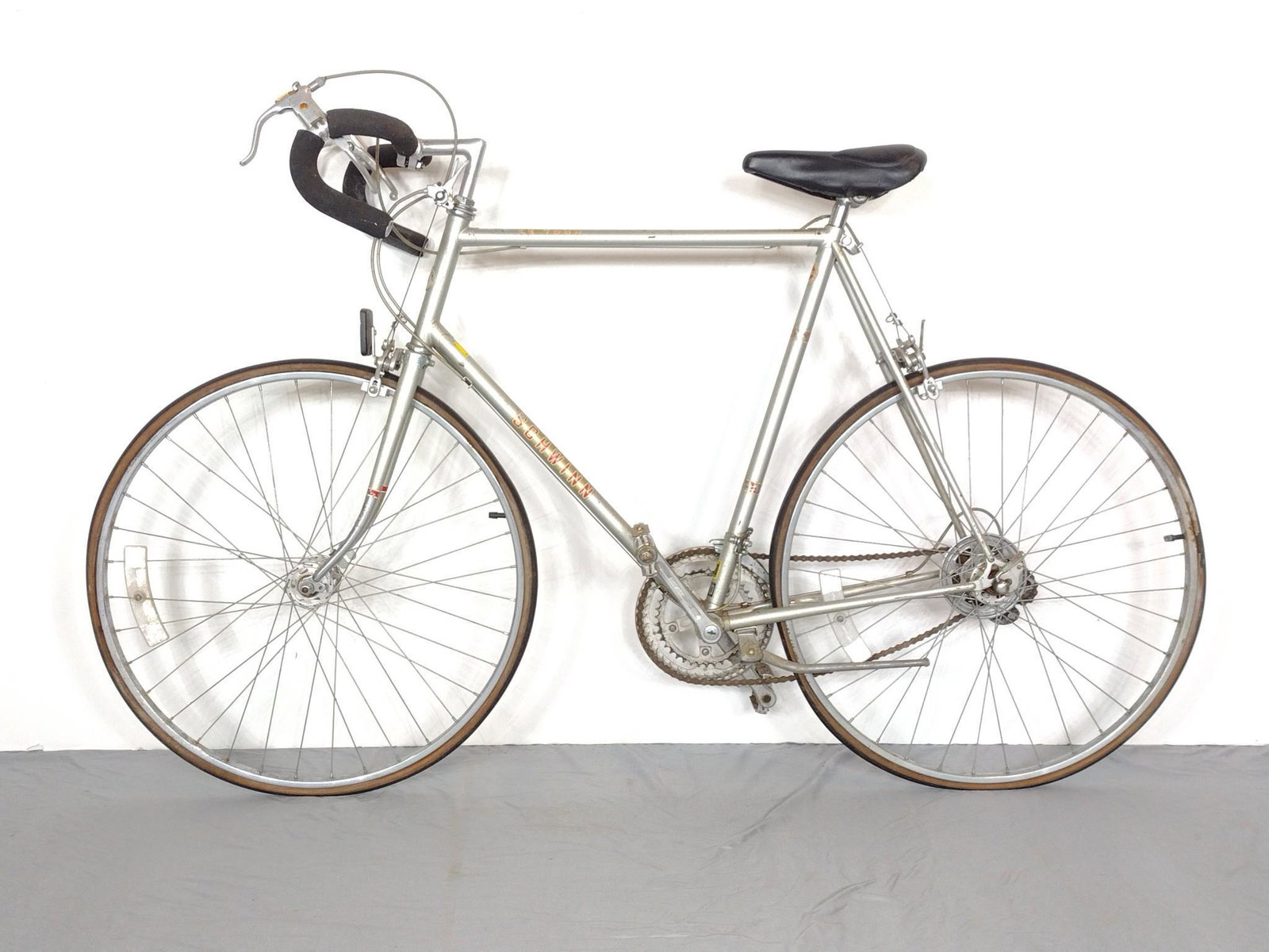 Schwinn LR Tour Bike: 16" wide X 67" long X 41" high. Has paint loss and discoloring. Also has some rust. MG. IMPORTANT: Before bidding, please read the terms and conditions. When you registered for the auction you agreed 