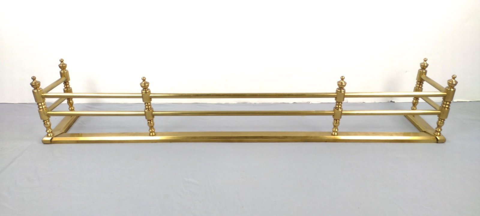 Brass Fire Fender: 48" wide X 7-3/4" deep X 8-1/2" high. DM IMPORTANT: Before bidding, please read the terms and conditions. When you registered for the auction you agreed to these terms and will be required to comply w