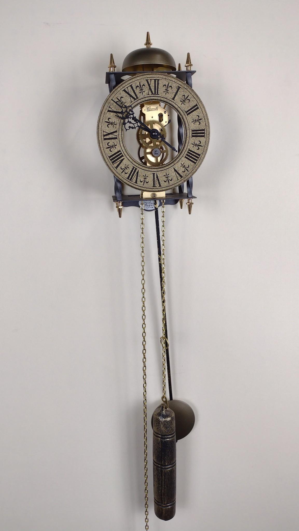 Hermle Wall Clock: Working. 5-1/2" wide IMPORTANT: Before bidding, please read the terms and conditions. When you registered for the auction you agreed to these terms and will be required to comply with them.