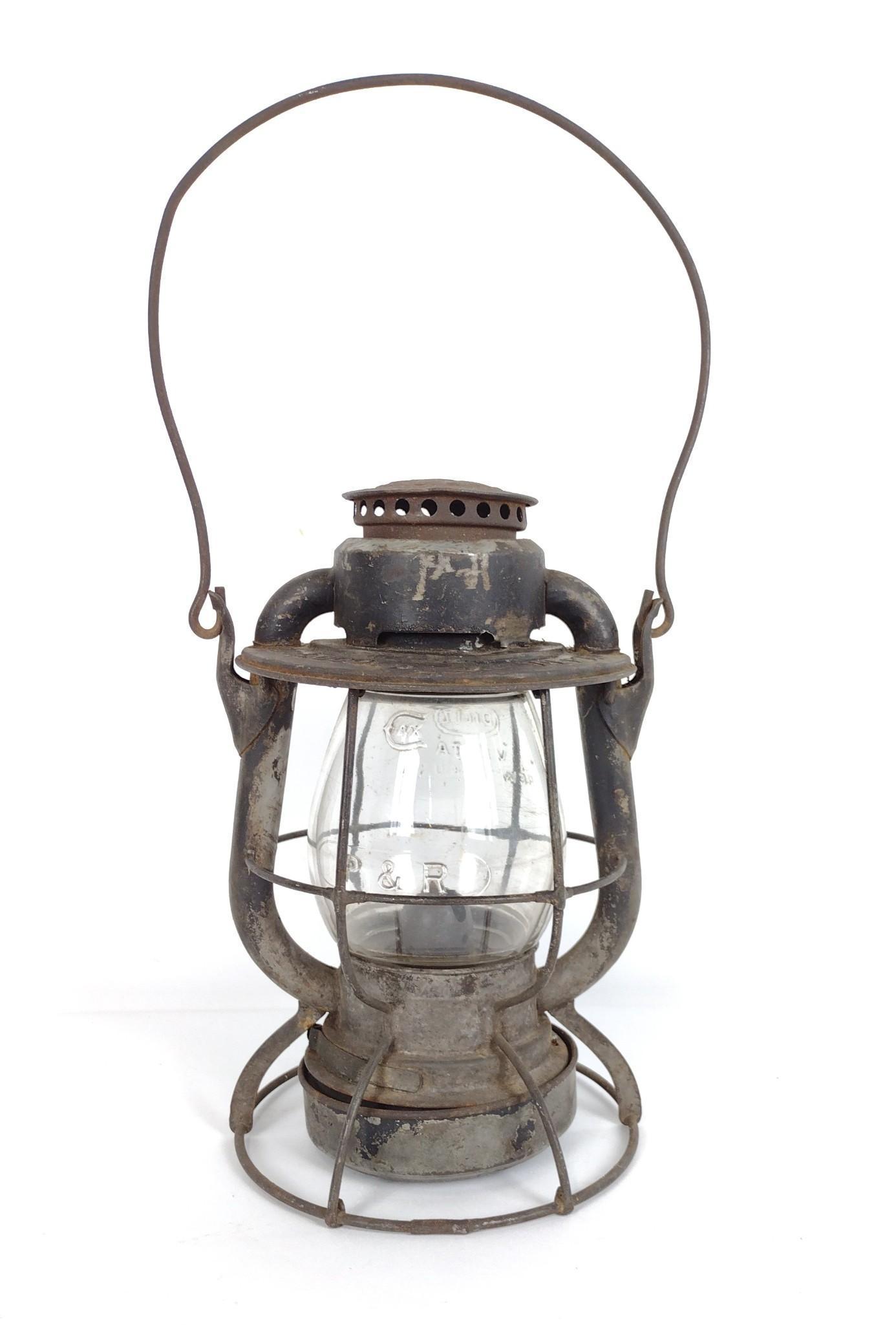 PRR Lantern: Lantern and shade marked PRR. 8" wide x 15" high. Some paint losses. RM IMPORTANT: Before bidding, please read the terms and conditions. When you registered for the auction you agreed to these terms a