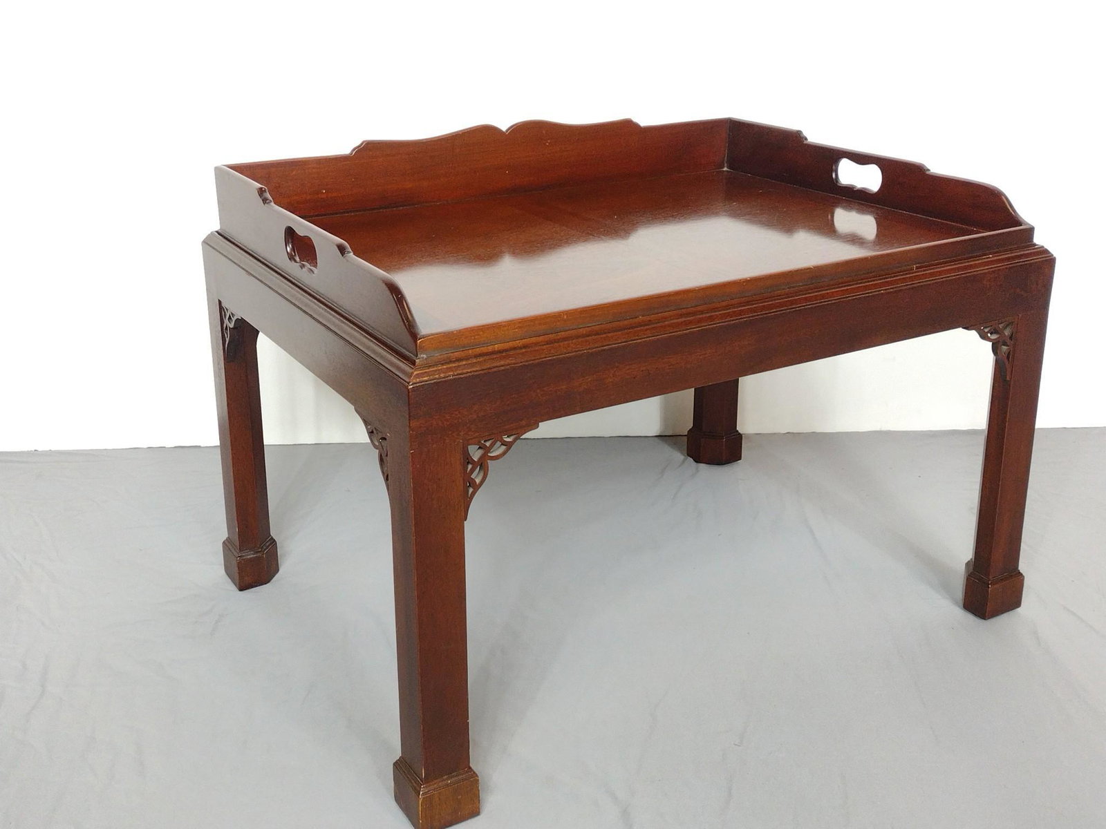 Baker Furniture Co Historic Charleston Reproductions Tray Table: 31" wide X 22-1/2" deep X 21-3/4" high. Some surface wear. MG. IMPORTANT: Before bidding, please read the terms and conditions. When you registered for the auction you agreed to these terms and will b