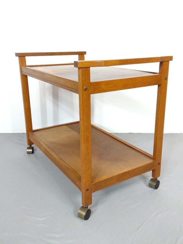 Rolling Tea Cart: 30-1/4" wide X 18" deep X 24-1/2" high. Has some scratches and discoloring in areas. MG. IMPORTANT: Before bidding, please read the terms and conditions. When you registered for the auction you agreed