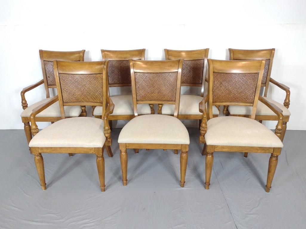 7 Bassett Dining Chairs: Arm Chairs 26" wide X 23" deep X 38" high. Side chairs 22" wide X 22" deep X 38" high. One of the wicker backs has a small hole in it. MG IMPORTANT: Before bidding, please read the terms and condition