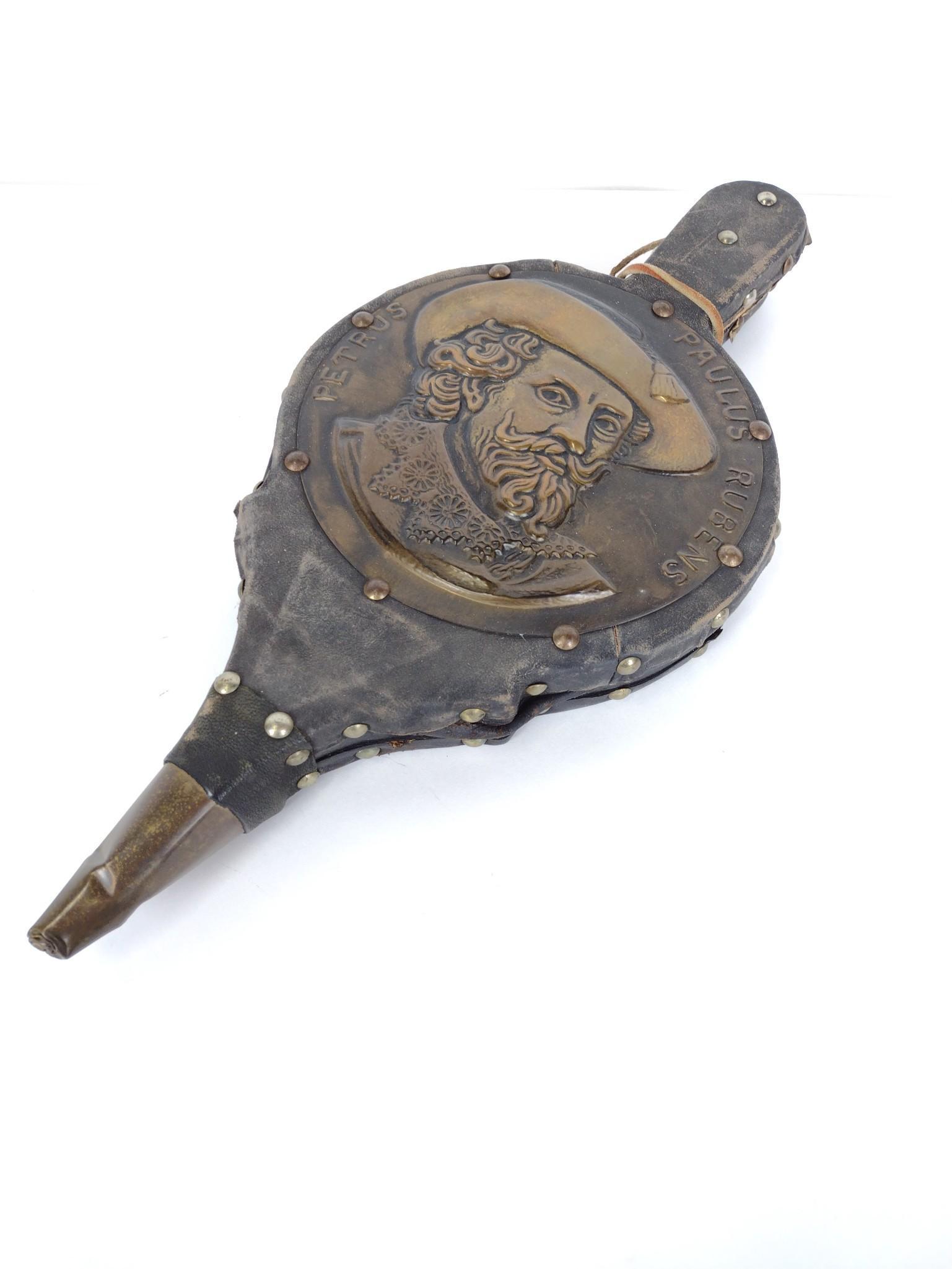 Paulus Rubens Bellows: Leather wrapped with brass plate. 28" long x 8-3/8" wide. Tip mis-shaped. RM IMPORTANT: Before bidding, please read the terms and conditions. When you registered for the auction you agreed to these te