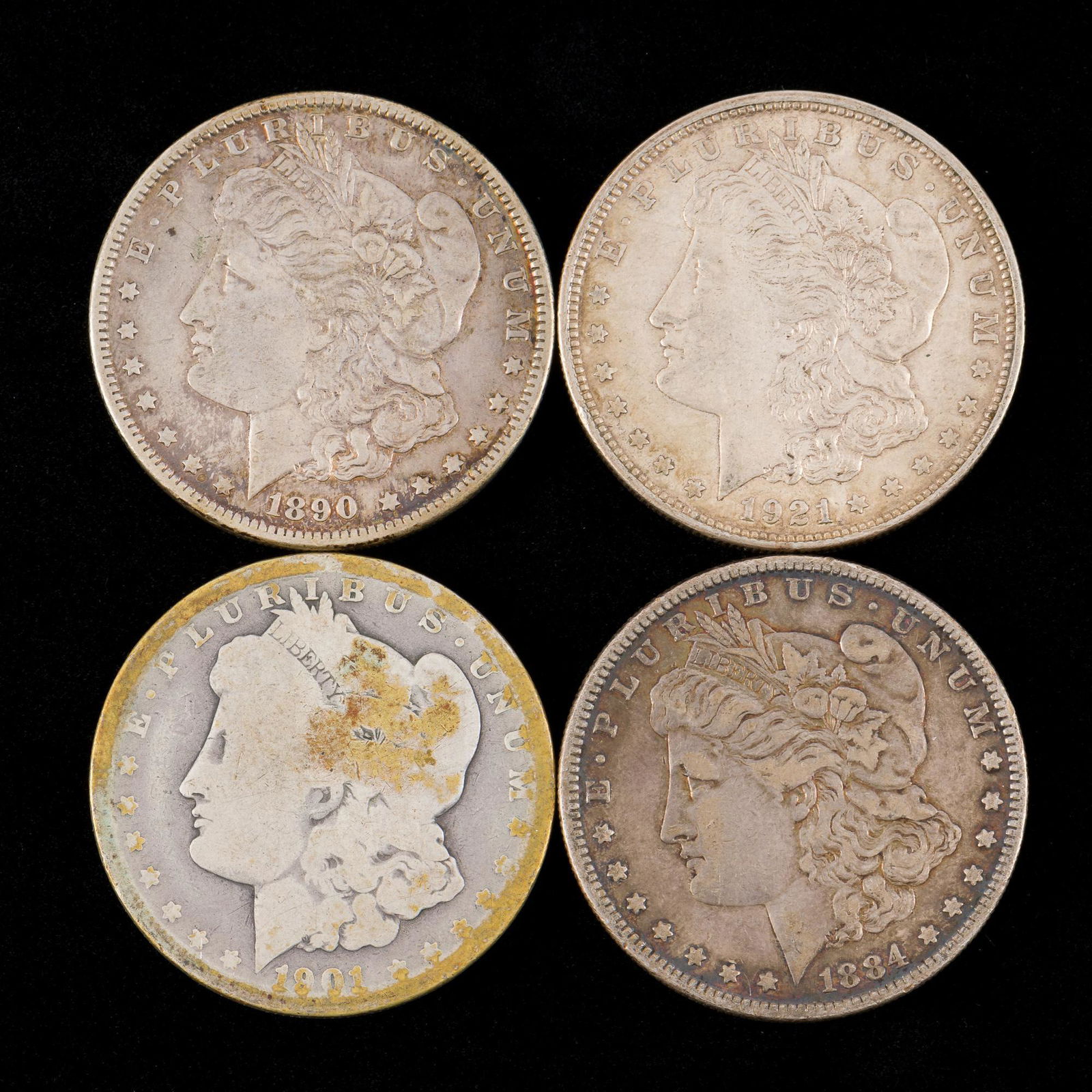 4 Morgan Silver Dollars Incl 1884 (1 of 2)