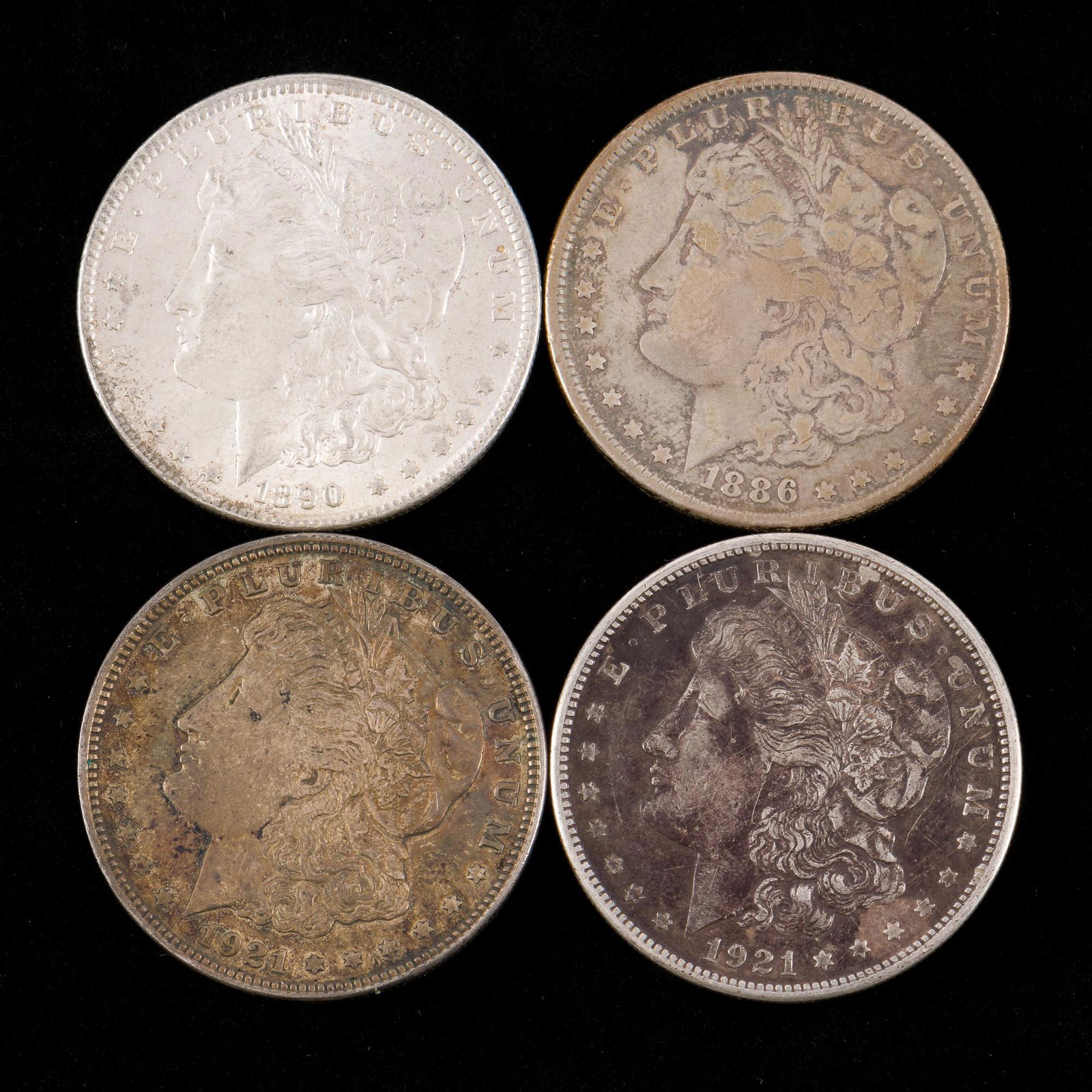 4 Morgan Silver Dollars Incl 1886 (1 of 2)