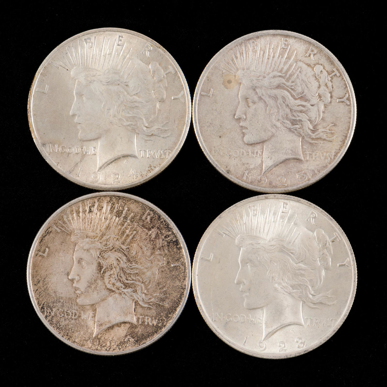 4 Peace Silver Dollars Incl 1925 (1 of 2)