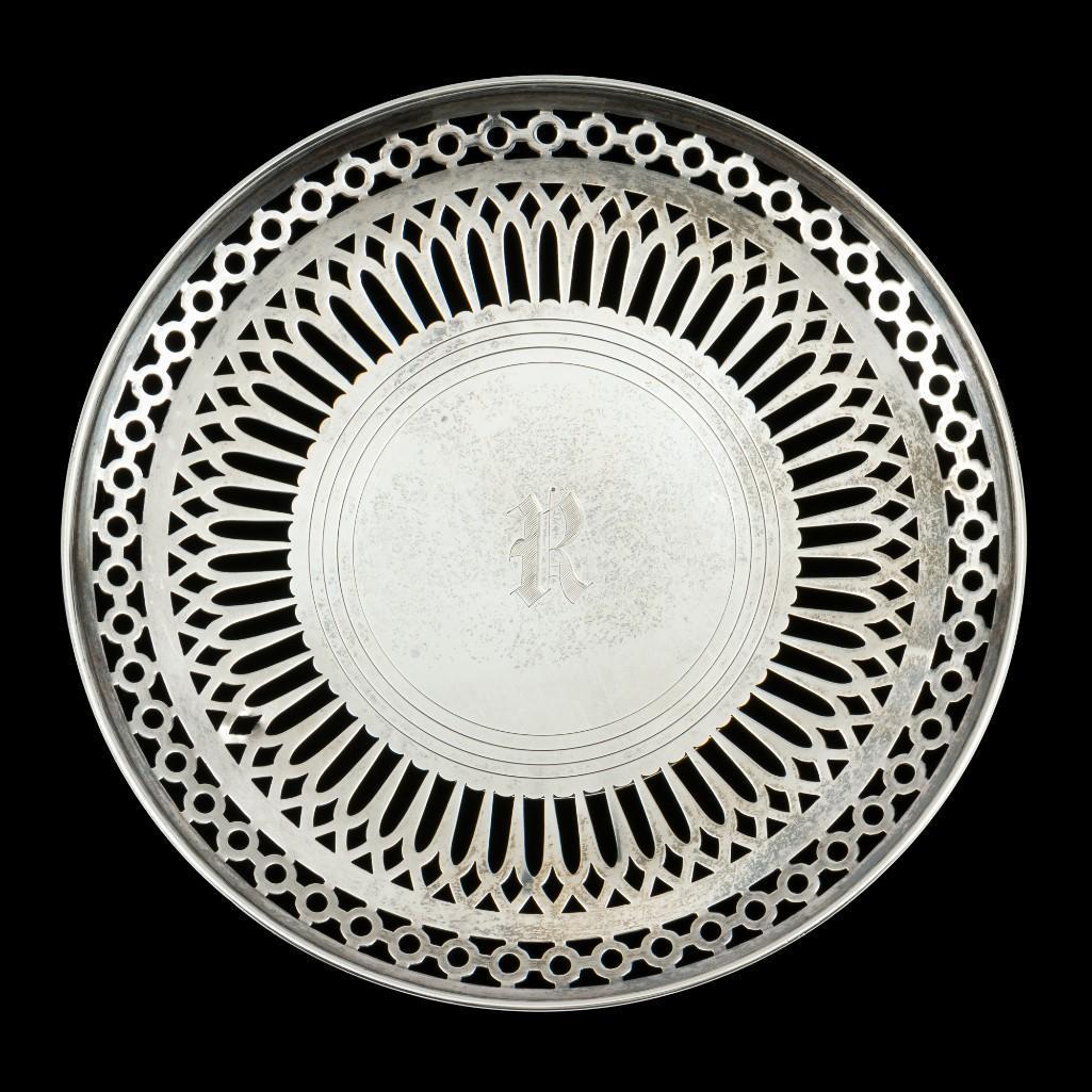 Dominick & Haff Sterling Pedestal Cake Plate: Dominick & Haff Sterling reticulated pedestal cake plate. Retailed by Theodore B. Starr. C. 1910. Monogrammed. 6-7/8" diameter x 3/4" high. 3.8 ozt. RM IMPORTANT: Before bidding, please read the terms
