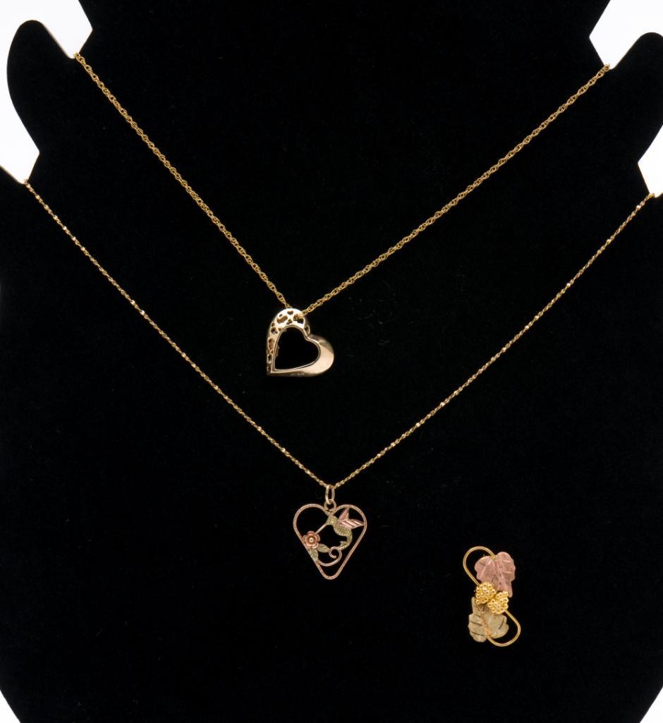 3 Pcs 10K Jewelry: Includes two pendants on gold filled chains and a brooch. Chains 19" long. Brooch 1" long. 2.3 dwt overall. MH. IMPORTANT: Before bidding, please read the terms and conditions. When you registered for