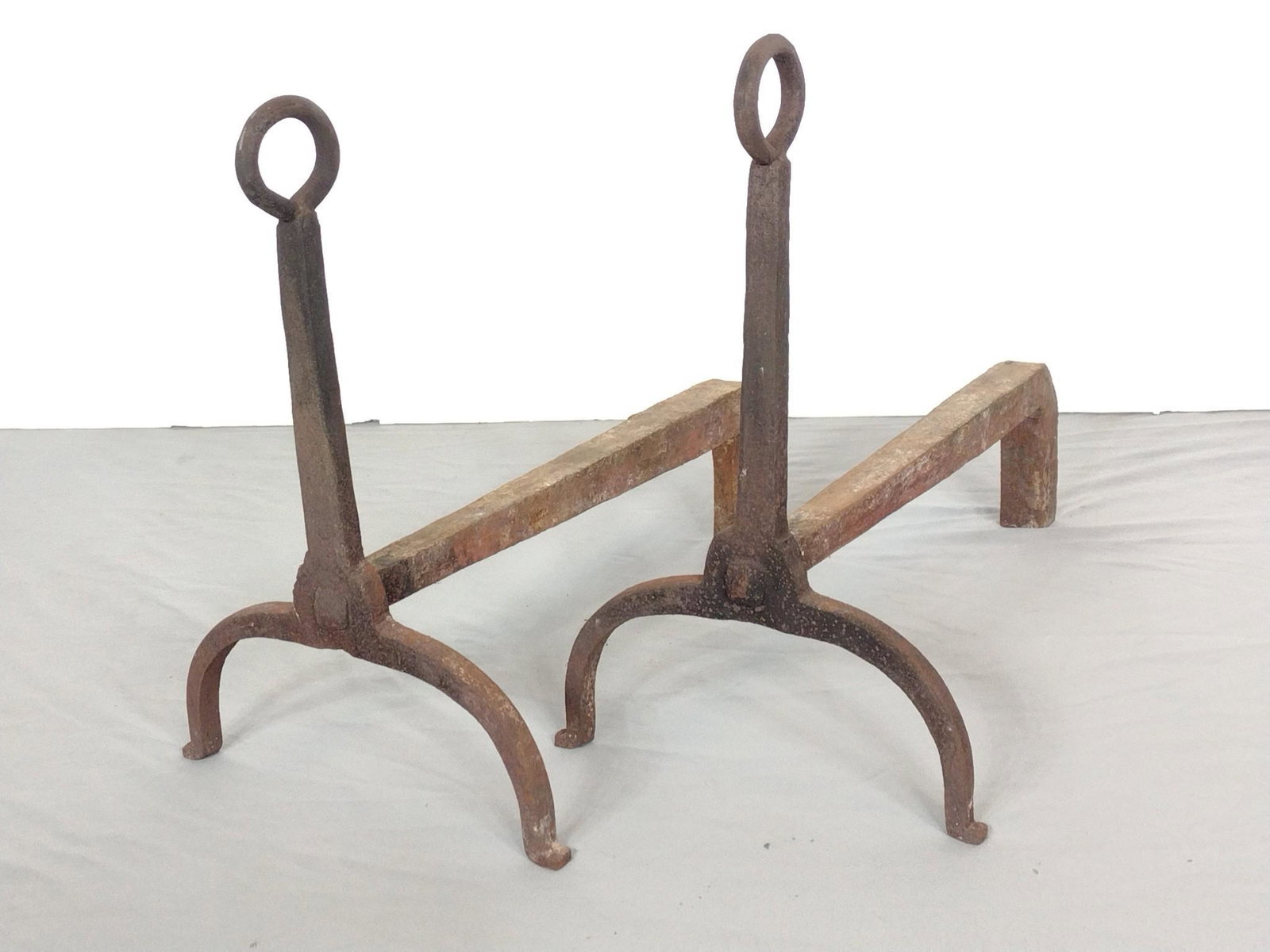 Antique Wrought Iron Andirons: 9-1/2" wide X 17-1/2" deep X 15-1/2" high. MG. IMPORTANT: Before bidding, please read the terms and conditions. When you registered for the auction you agreed to these terms and will be required to co