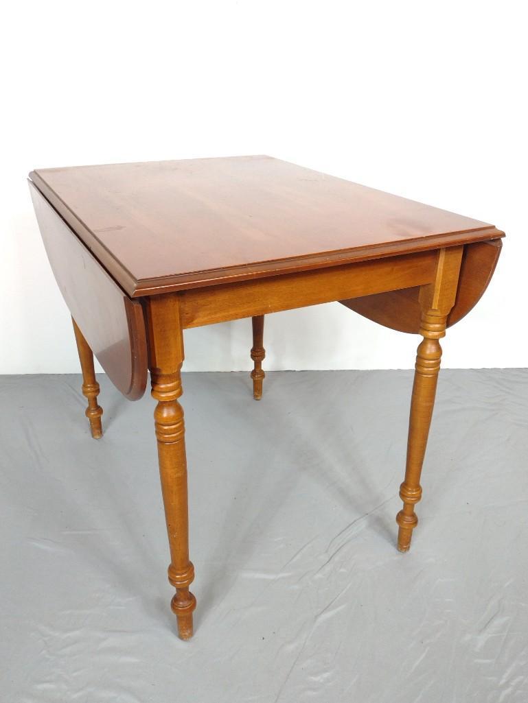 Drop Side Table: Open 45-1/2", closed 24" wide X 36-1/2" deep X 30" high. Top has a few light scratches and some small areas of discoloring. MG. IMPORTANT: Before bidding, please read the terms and conditions. When yo