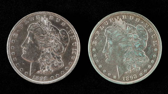 2 Morgan Silver Dollars Incl 1892: Also includes 1892-O. About uncirculated and extra fine. RM IMPORTANT: Before bidding, please read the terms and conditions. When you registered for the auction you agreed to these terms and will be r