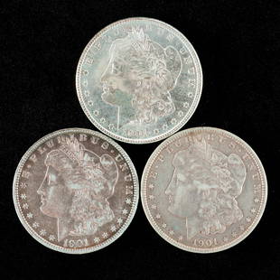 3 Morgan Silver Dollars Incl 1901: Also includes 1901-O and 1901-S. Very fine, about uncirculated, and very fine. RM IMPORTANT: Before bidding, please read the terms and conditions. When you registered for the auction you agreed to