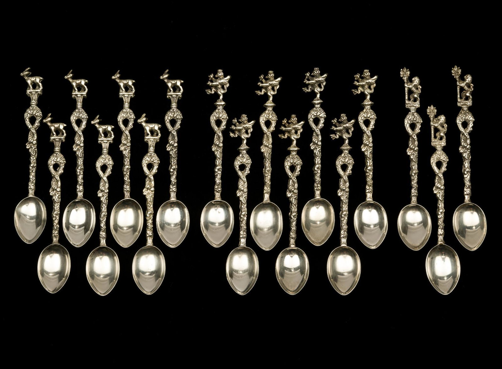 17 Italian Figural Silver Plate Demitasse Spoons: Seventeen Italian figural silver plate demitasse spoons. Includes 7 winged griffins, 7 goats and 3 rampant lions. All marked for Italy. 5-1/4" to 5-1/2" long. KE. IMPORTANT: Before bidding, please rea
