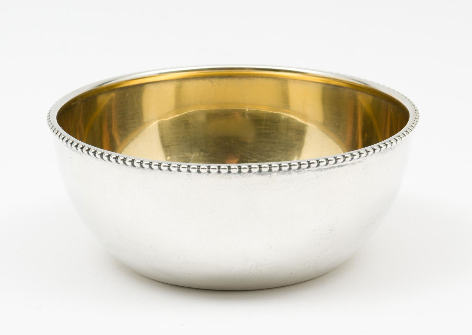 Gorham Sterling Finger Bowl: Gorham sterling finger bowl. Gold washed interior. Monogrammed. Marked #A505 to bottom. 1928 - 1949. 1-3/4" high x 4" diameter. 2.6 troy ounces. KE. IMPORTANT: Before bidding, please read the terms an