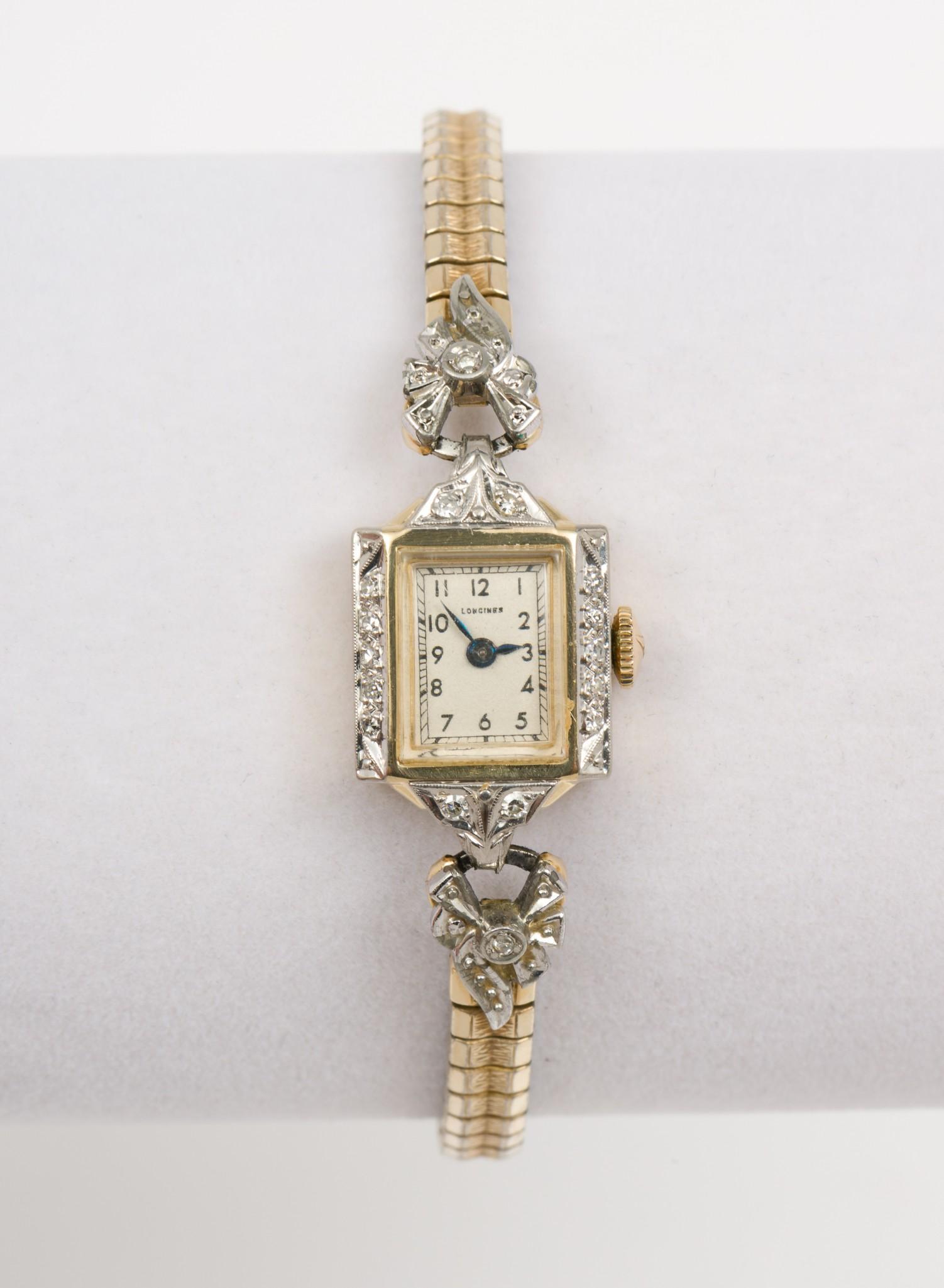 Ladies 14K & .22 CTW Diamond Longines Wristwatch: 17 jewels. Stamped 14k case set with ten 1-point each and six 2-point each single cut diamonds. Case weight only 2 dwt. Gold filled band. 2-1/4" diameter. 1" lug to lug. Running. KE/EK. IMPORTANT: Bef