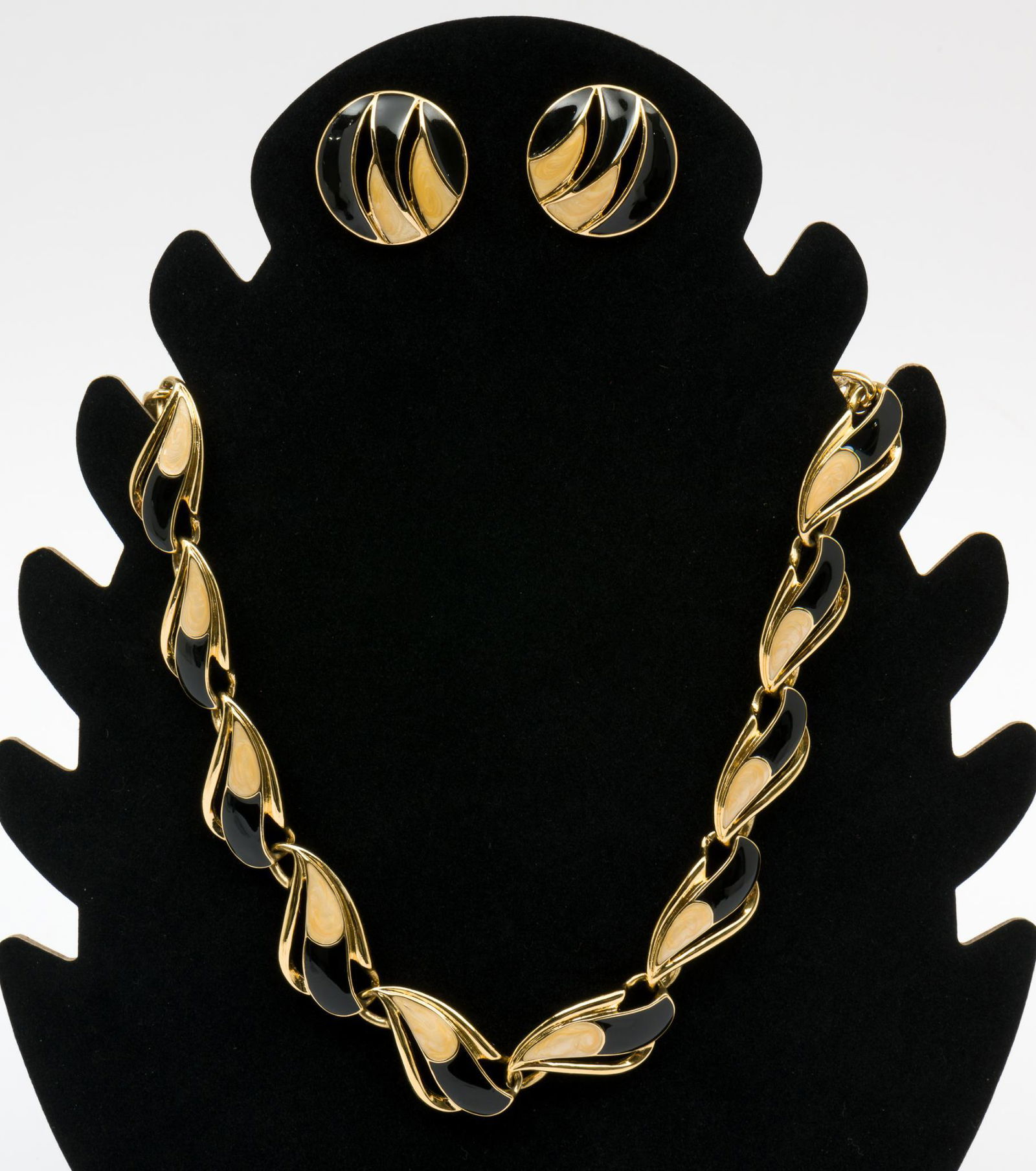 Trifari Necklace & Earrings: All marked for Trifari. Necklace 16" long x 3/4" wide. Earrings 1-1/4" diameter. KE. IMPORTANT: Before bidding, please read the terms and conditions. When you registered for the auction you agreed to