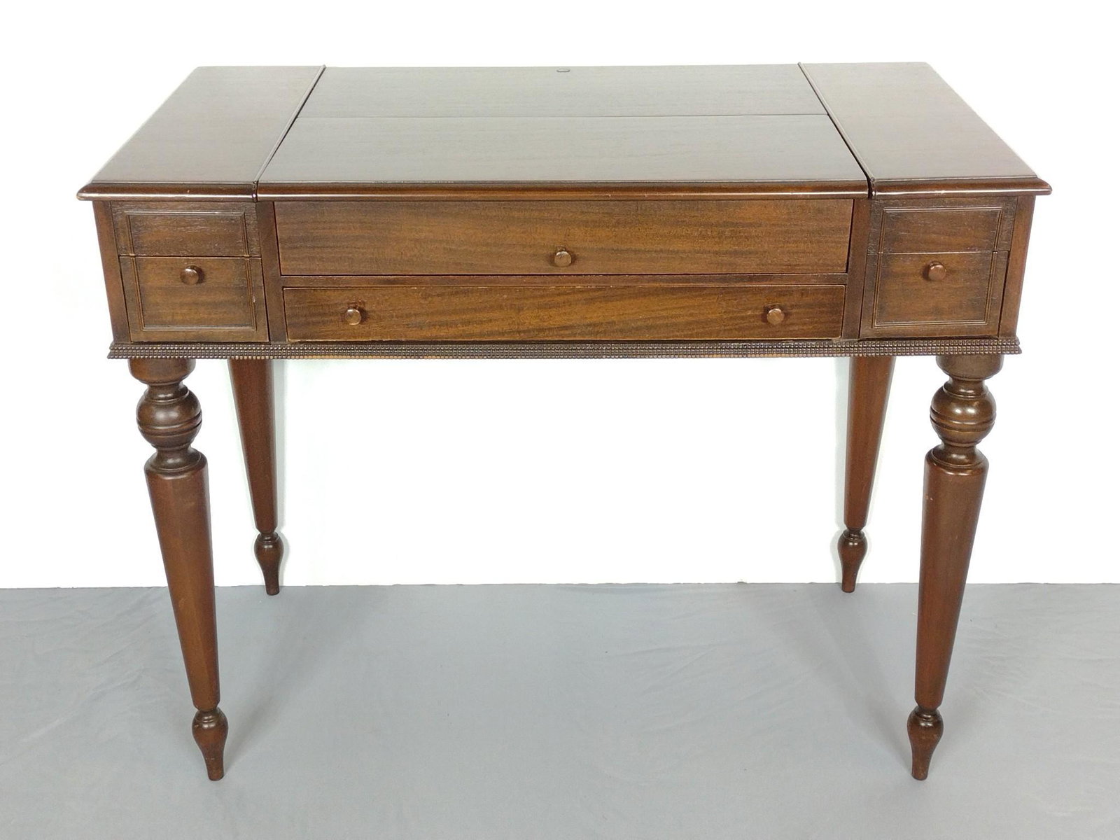 Spinet Desk: 40" wide X 21" deep X 32-3/4" high. Has a few light scratches. MG. IMPORTANT: Before bidding, please read the terms and conditions. When you registered for the auction you agreed to these terms and wi