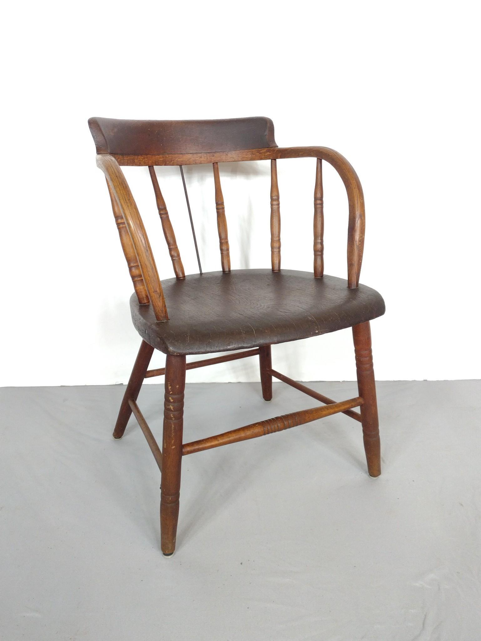 Antique Barrel Back Chair: 18-1/2" wide X 18" deep X 29-1/2" high. Has repair to plank bottom. MG. IMPORTANT: Before bidding, please read the terms and conditions. When you registered for the auction you agreed to these terms a