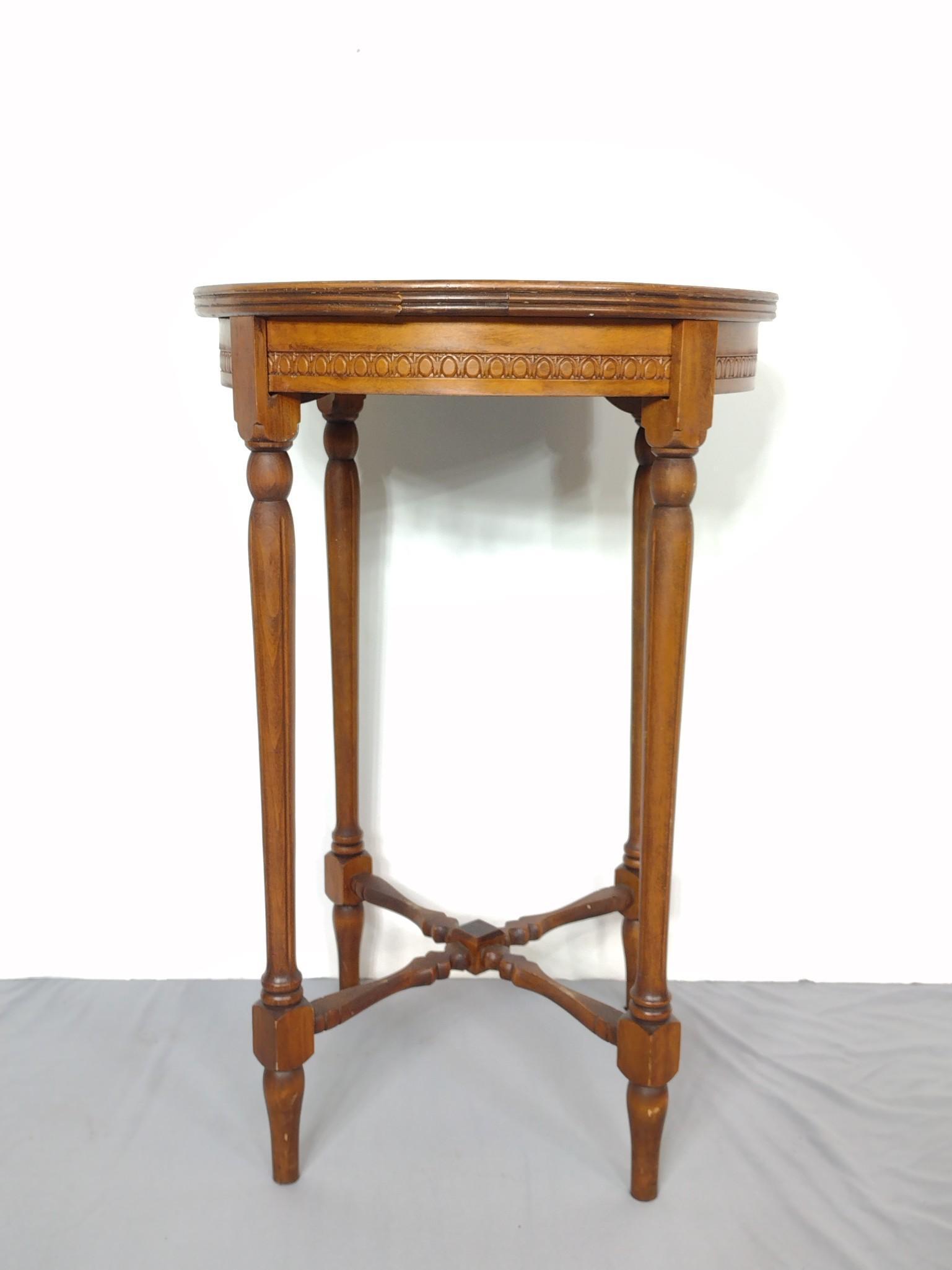 Round Occasional Table: 17-3/4" diameter X 27-1/4" high. Has some light scratches. MG. IMPORTANT: Before bidding, please read the terms and conditions. When you registered for the auction you agreed to these terms and will b