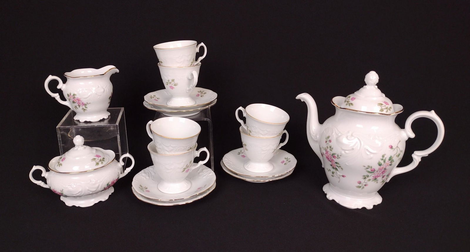 15 Pc Wawel Tea Service: Saucer: 5" diameter. Cup/teapot: 3" to 7-1/2" high. Sugar with crack to one handle. DM IMPORTANT: Before bidding, please read the terms and conditions. When you registered for the auction you agreed t