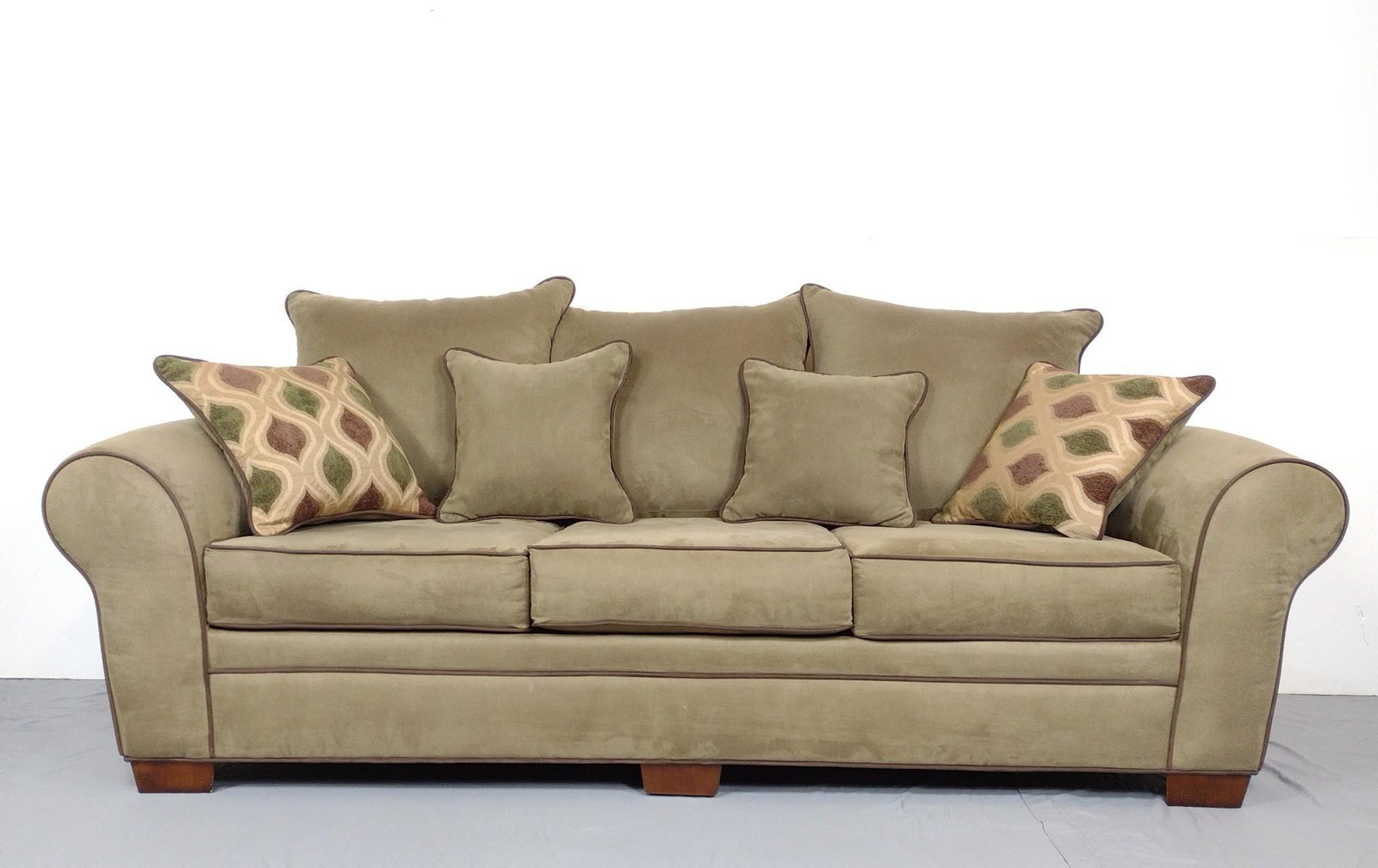 Large Taupe Sofa: No manufactures markings. 97" wide X 39" deep X 39" high. Has some spots of discoloring. MG. IMPORTANT: Before bidding, please read the terms and conditions. When you registered for the auction you ag