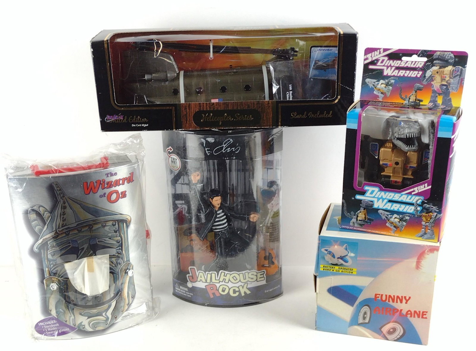 5 Vintage Toys Incl Wizard of Oz: Also includes Elvis Presley, Funny Airplane, Dinosaur Warrior, and InAir Ltd. Ed. Helicopter Series die cast model. All in original boxes. DP IMPORTANT: Before bidding, please read the terms and condi