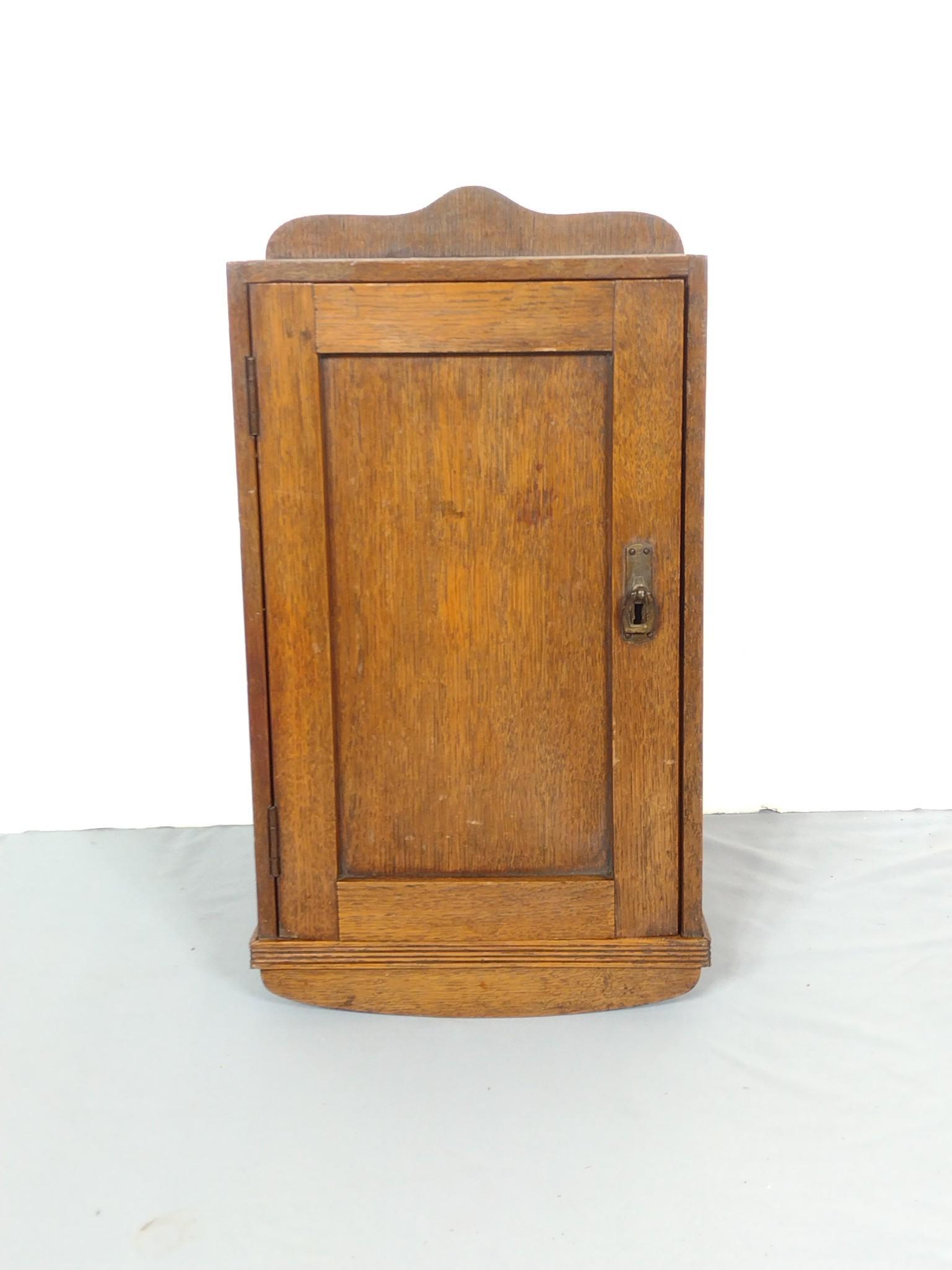 Wall Cabinet: 11-1/2" wide X 7-3/4" deep X 19-1/2" high. Door has a warp. Has some discoloring and scratches. MG. IMPORTANT: Before bidding, please read the terms and conditions. When you registered for the auction