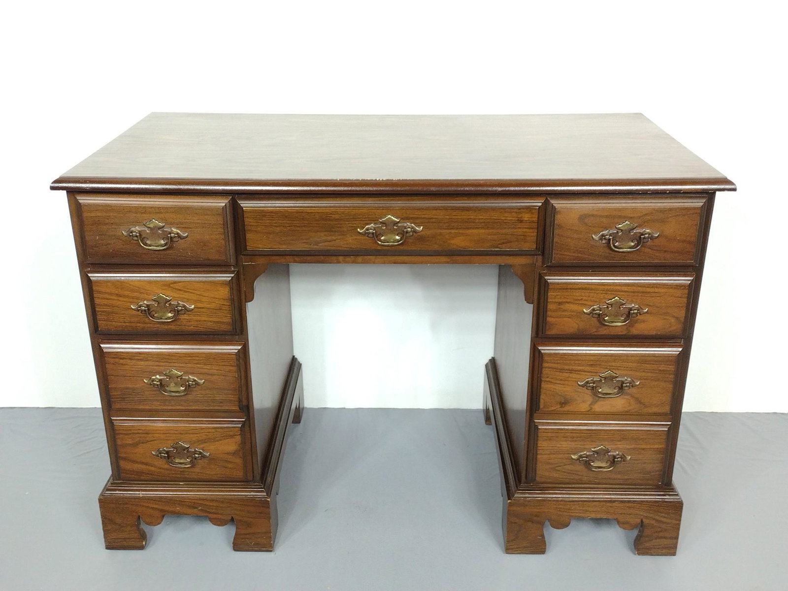 Knee-Hole Desk: 44" wide X 22" deep X 30-1/4" high. Has a few scratches. MG. IMPORTANT: Before bidding, please read the terms and conditions. When you registered for the auction you agreed to these terms and will be 