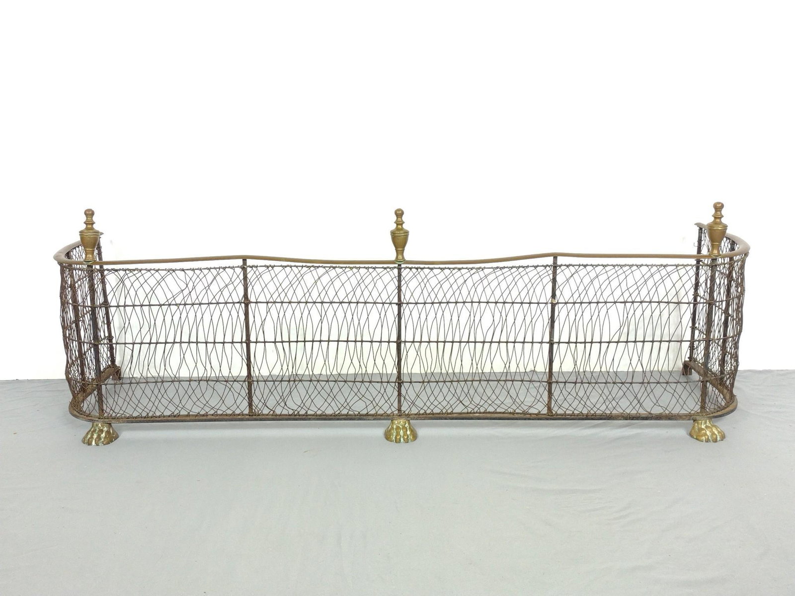 Fire Fender: 48-1/2" wide X 13" deep X 16" high. Has discoloring. Metal wires are bent out of shape. MG. IMPORTANT: Before bidding, please read the terms and conditions. When you registered for the auction you agr