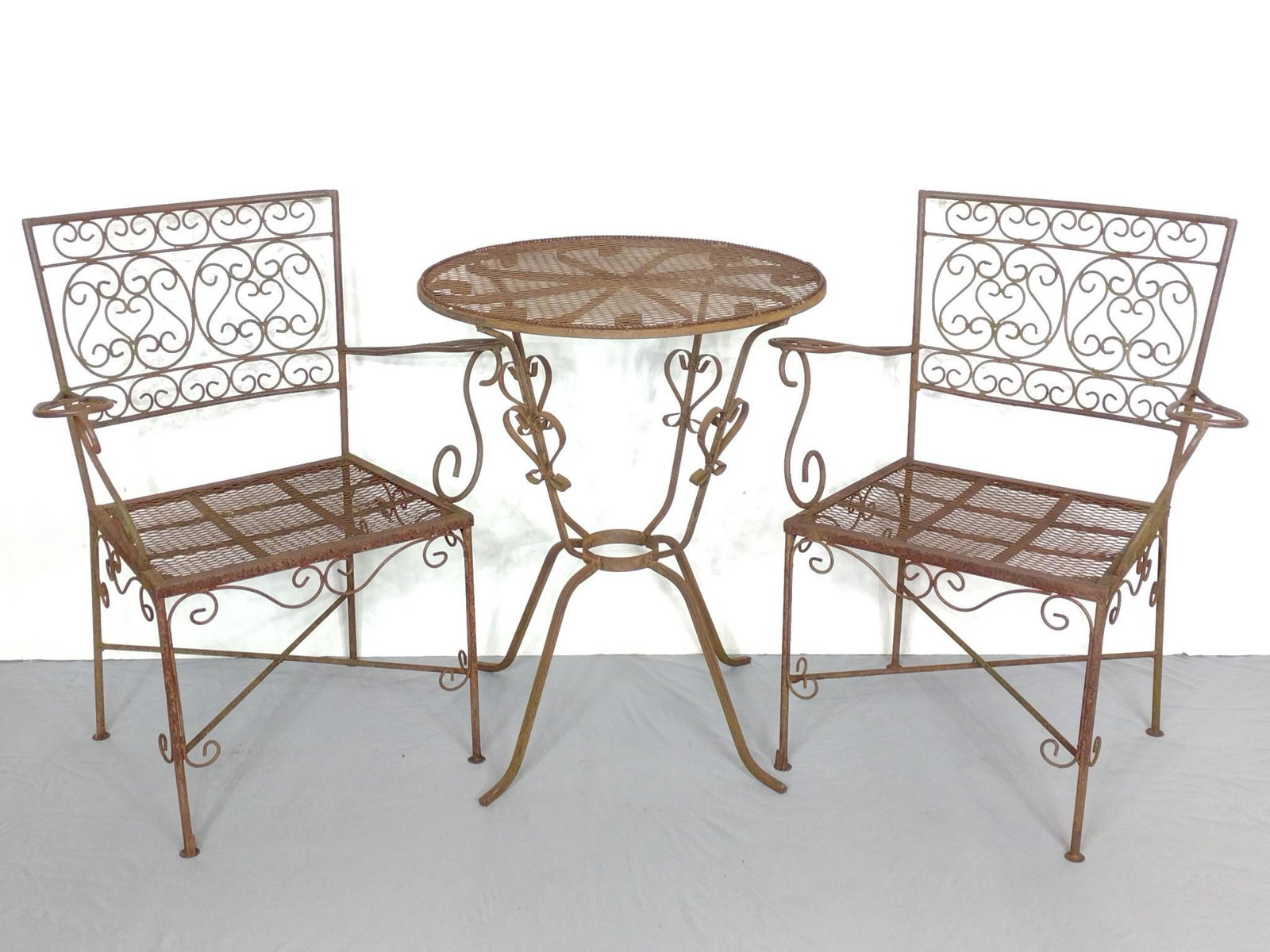 3 Pcs Bistro Set: Table 24" diameter X 29-1/2" high. Arm Chairs 27-1/4" wide X 15-1/2" deep X 33" high. Heavy rust on all Pcs. MG. IMPORTANT: Before bidding, please read the terms and conditions. When you registered fo
