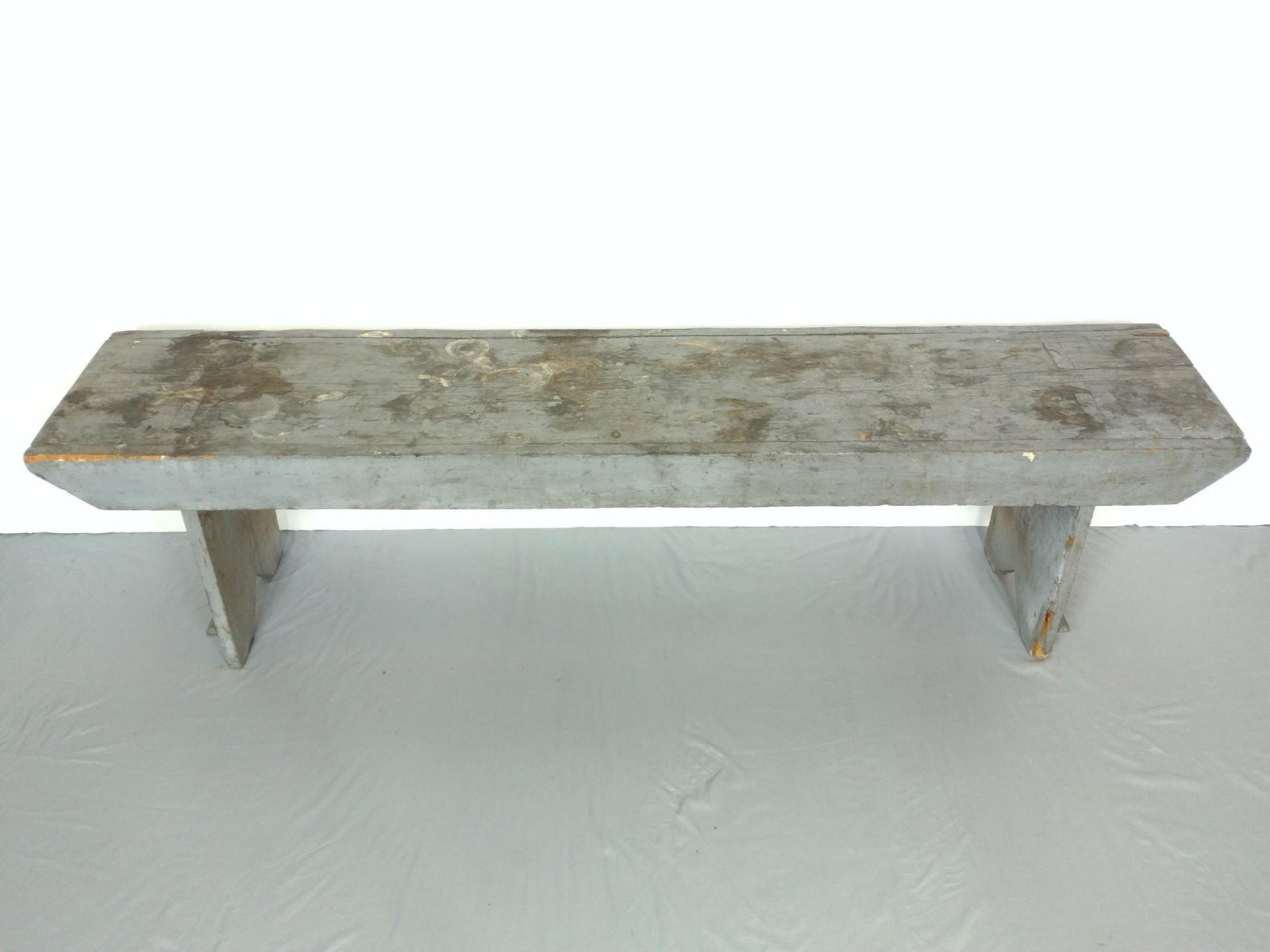 Painted Bench: 66-1/2" wide X 13-3/4" deep X 18" high. Has some paint loss and discoloring. MG. IMPORTANT: Before bidding, please read the terms and conditions. When you registered for the auction you agreed to thes