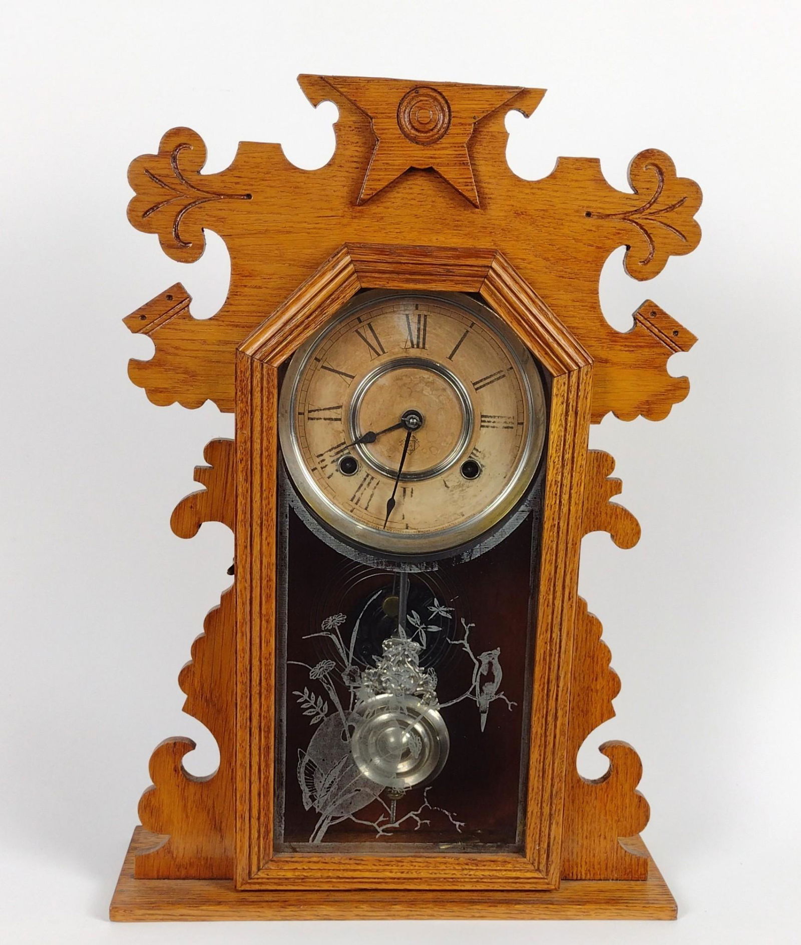 Ansonia Mantel Clock: Working. 13" wide X 4-1/2" deep X 18" high. Crest cut off. DM IMPORTANT: Before bidding, please read the terms and conditions. When you registered for the auction you agreed to these terms and will be